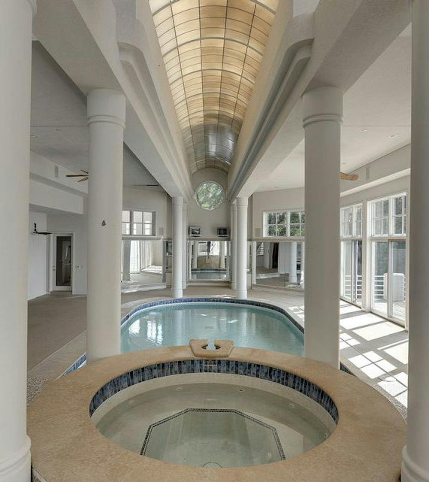 Spacecrafting Indoor pool under barrel-vaulted ceiling