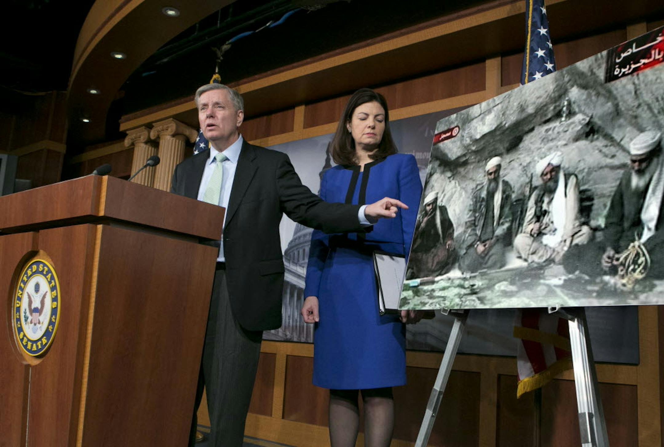 Sen. Lindsey Graham, R-S.C., accompanied by Sen. Kelly Ayotte, R-N.H., speaks to reporters on Capitol Hill In Washington, Thursday, March 7, 2013, about the capture of Osama Bin Laden's son-in-law Sulaiman Abu Ghaith.