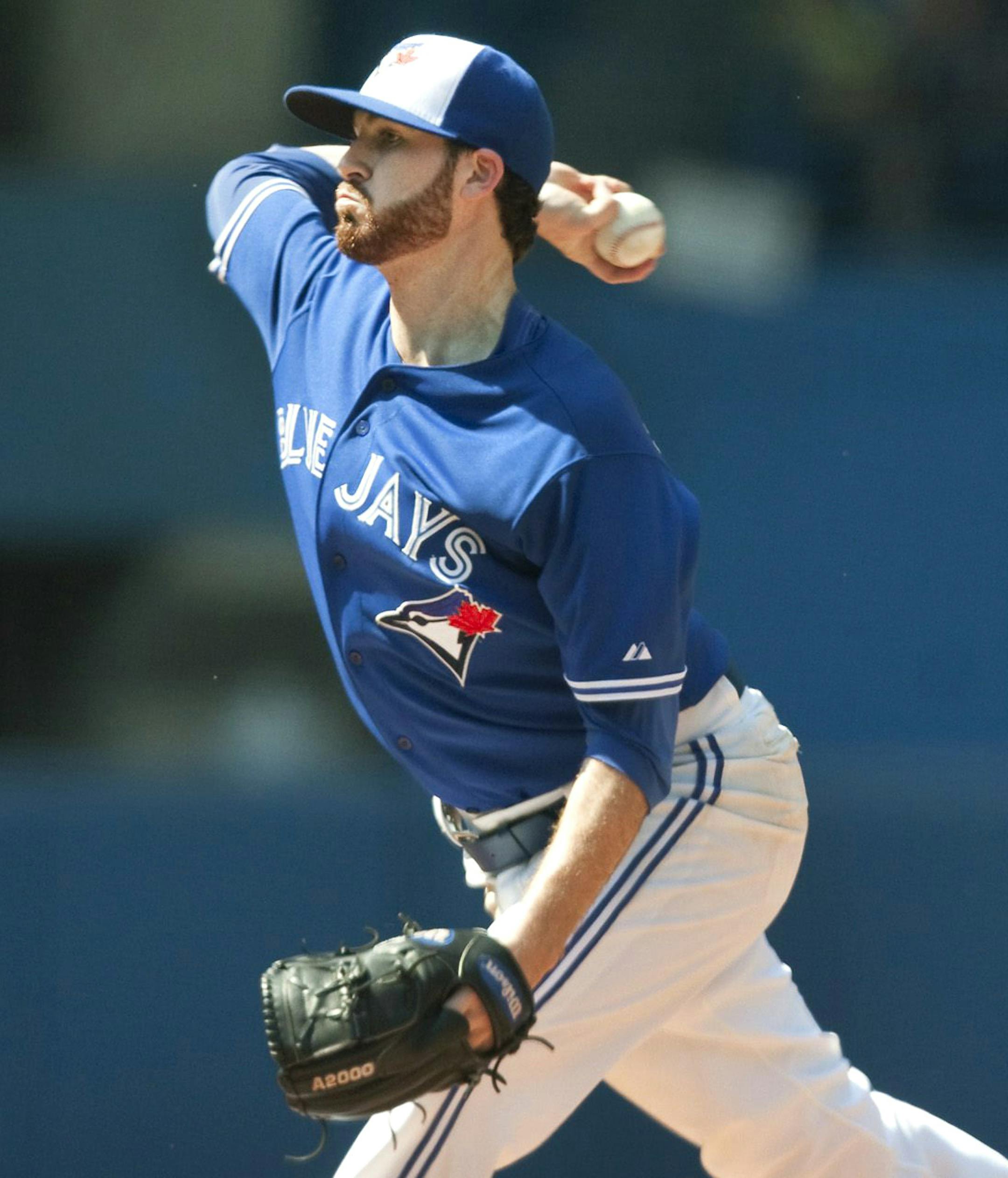 Toronto Blue Jays starting pitcher Drew Hutchison throwing against the New York Yankees during the sixth inning of a baseball game in Toronto on Sunday, Aug. 16, 2015. (Fred Thornhill /The Canadian Press via AP) MANDATORY CREDIT