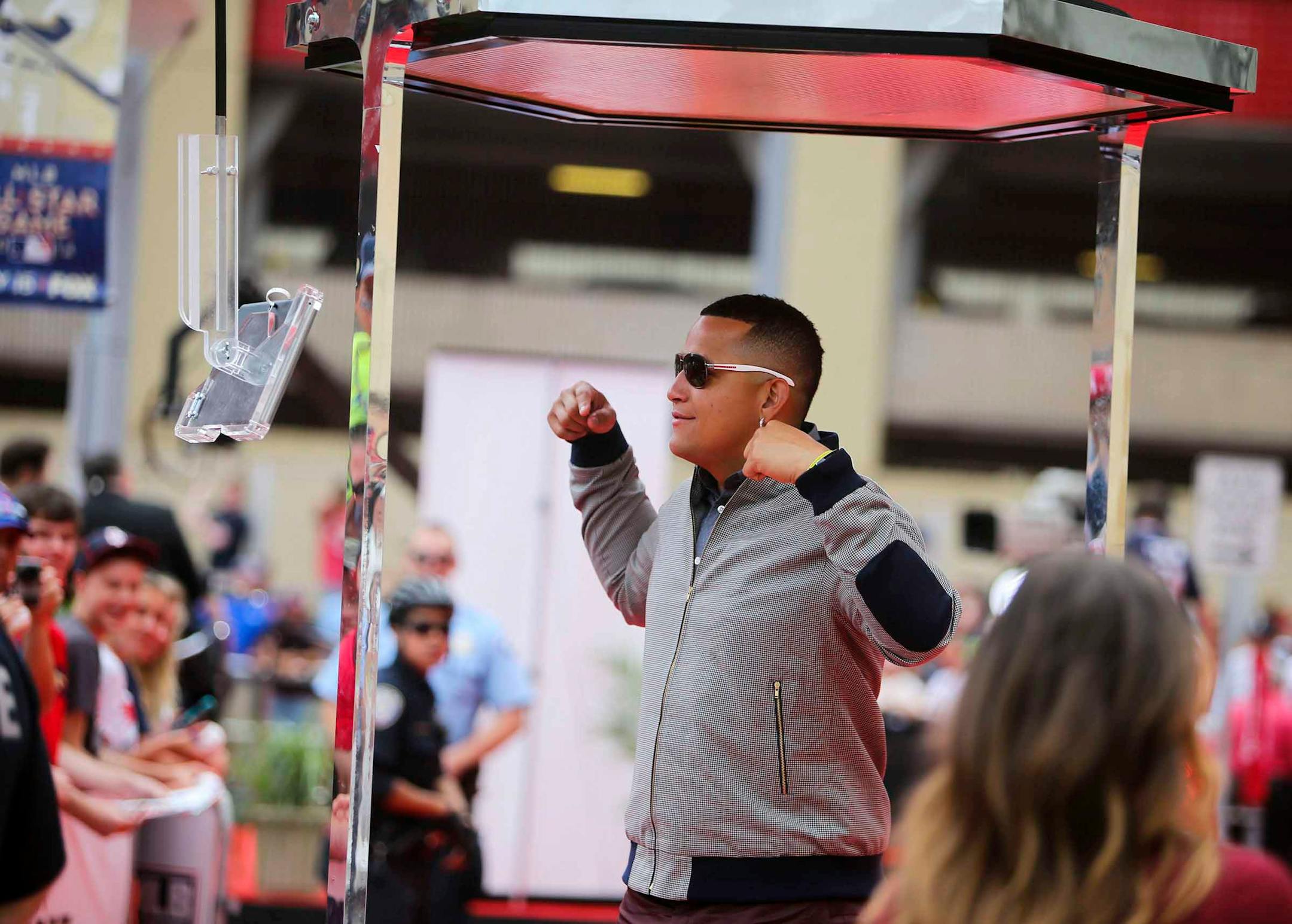 Detroit Tiger Miguel Cabrera flexes while inside a video booth during the 2014 All-Star Red Carpet ShowTuesday, July 15, 2015, at Target Field in Minneapolis, MN.] (DAVID JOLES/STARTRIBUNE) djoles@startribune 2014 All-Star Red Carpet Show Tuesday, July 15, 2015, at Target Field in Minneapolis, MN.