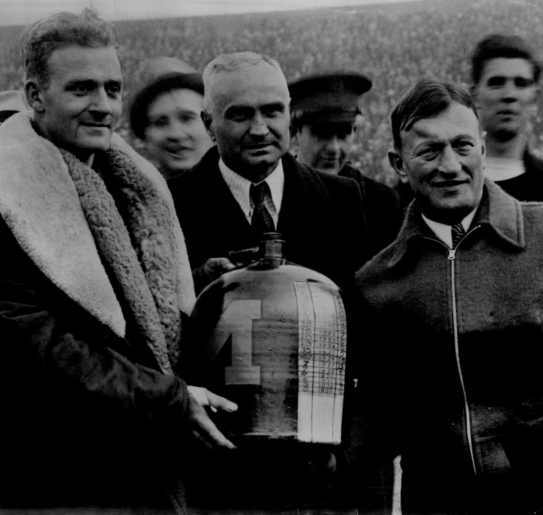 Coach Bernie Bierman, middle, and the Gophers football team beat Michigan in November of 1934 to earn the Little Brown Jug trophy. Younger Gophers fans, when considering P.J. Fleck the finest University of Minnesota football coach in the past century or so, might want to consider that Bierman won four national titles.