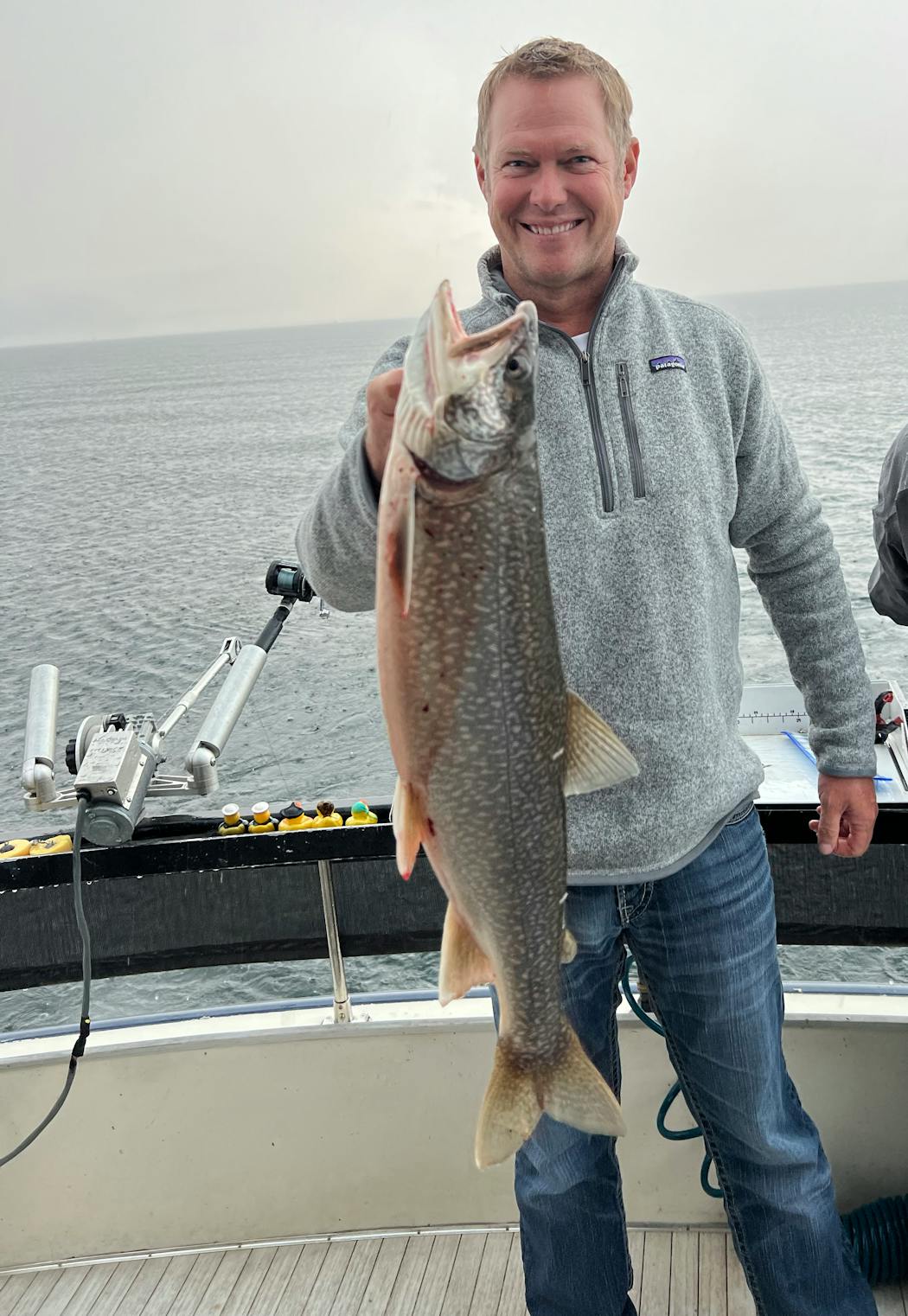 Pheasants Forever director of development David Bue with a dandy lake trout caught on Lake Superior out of Duluth.