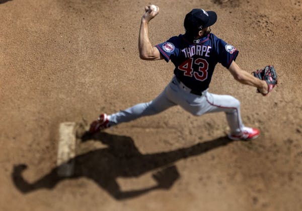 Minnesota Twins pitcher Lewis Thorpe (43) threw in the bullpen.