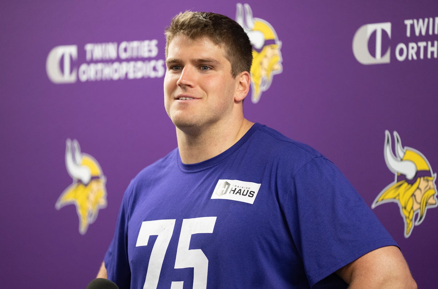 Minnesota Vikings offensive tackle Brian O'Neill speaks during a press conference Wednesday, May 03, 2023, at TCO Performance Centerl in Eagan, Minn. ]