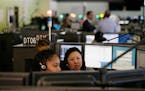 In this photo taken Aug. 2, 2019, is the 9-1-1 call center at the San Francisco Department of Emergency Management in San Francisco. (AP Photo/Eric Ri