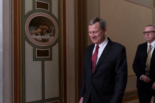 Chief Justice of the United States John Roberts departs the Capitol as the Senate finishes its work for the day in the impeachment trial of President Donald Trump on charges of abuse of power and obstruction of Congress, in Washington, Friday, Jan. 24, 2020. (AP Photo/J. Scott Applewhite)