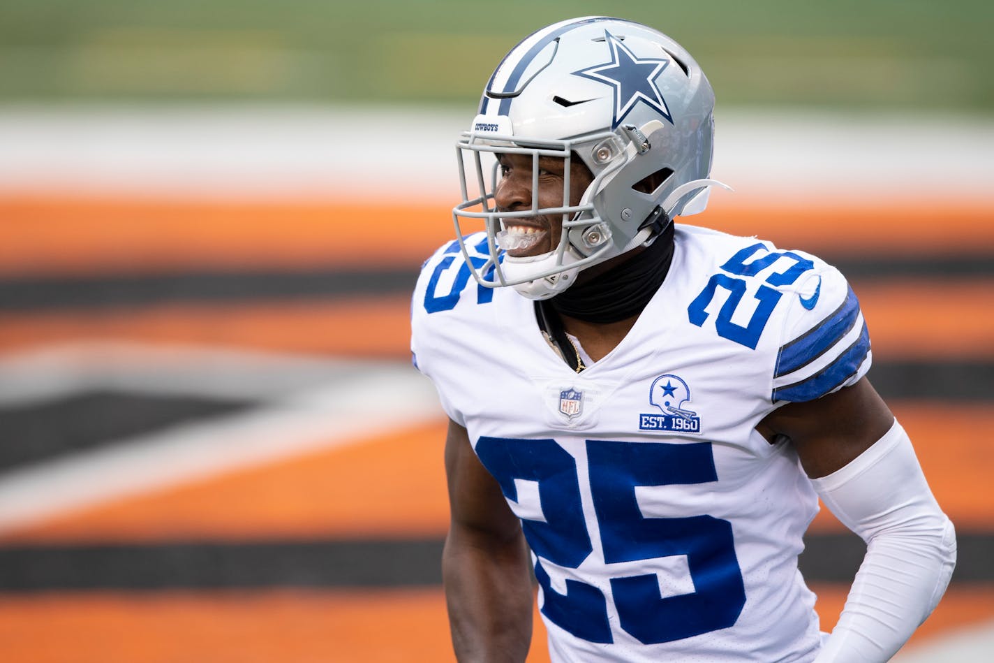 Dallas Cowboys free safety Xavier Woods (25) smiles during an NFL football game against the Cincinnati Bengals, Sunday, Dec. 13, 2020, in Cincinnati. (AP Photo/Emilee Chinn)