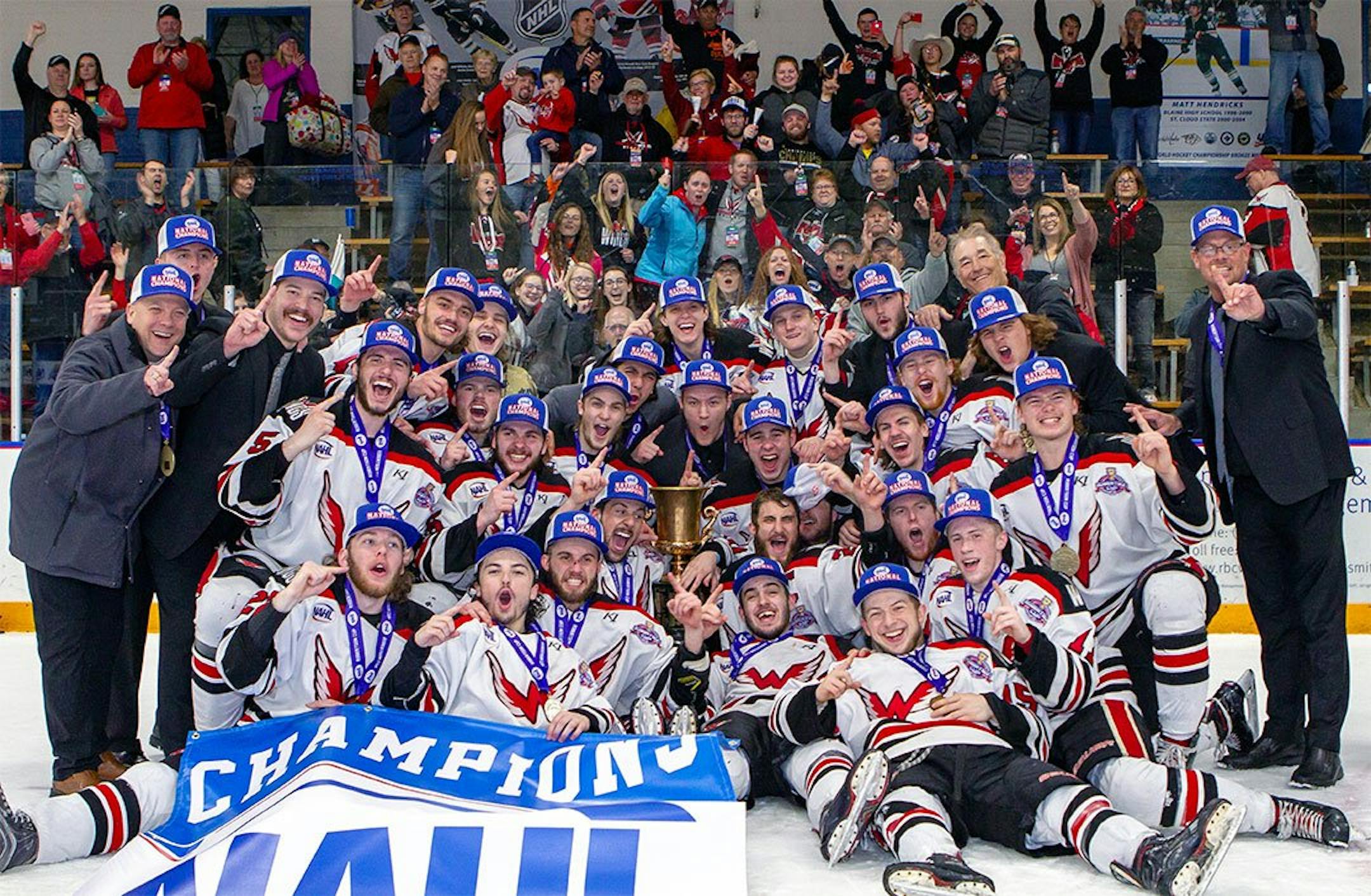 The Aberdeen Wings celebrated their 2-1 victory over the Fairbanks Ice Dogs in the North American Hockey League's Robertson Cup championship game on Tuesday at Fogerty Arena in Blaine.