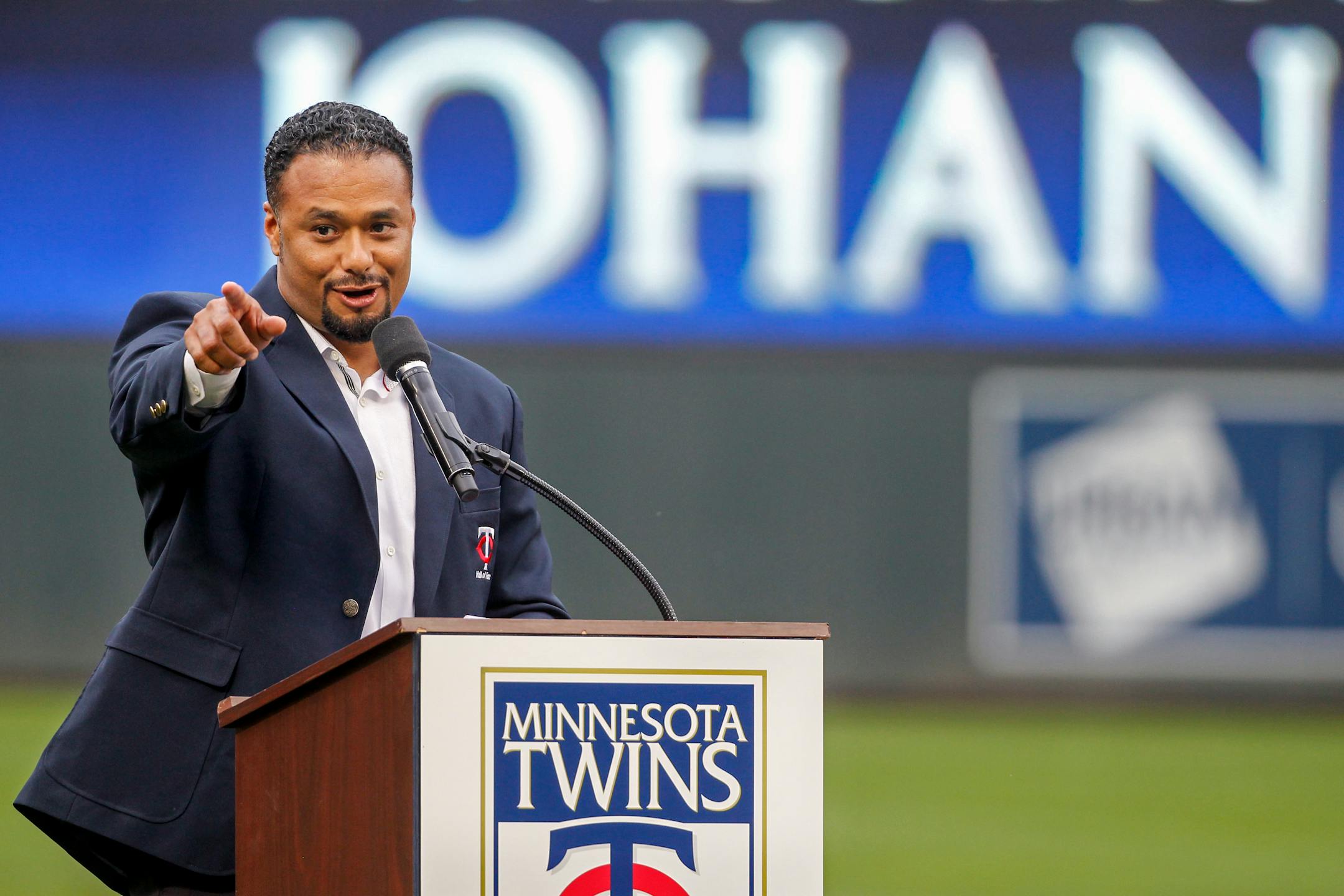 Former Twins pitcher Johan Santana speaks at his induction ceremony to the Minnesota Twins Hall of Fame before the baseball game with the Kansas City Royals on Saturday, Aug. 4, 2018, in Minneapolis. (AP Photo/Bruce Kluckhohn)