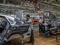 FILE -- Workers at a car manufacturing plant in Chakan, near Pune, India, an industrial hub, April 17, 2019. The Trump administration is on the cusp o