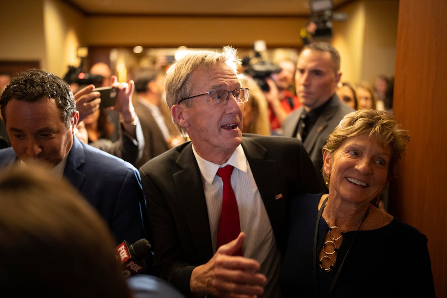 Republican gubernatorial candidate Scott Jensen, with his wife, Mary, enter the ballroom late Tuesday, Nov. 8, 2022, at the Minnesota Republican Party election night headquarters gathering at the Doubletree Hilton in St. Louis Park, Minn. (Jeff Wheeler/Star Tribune)