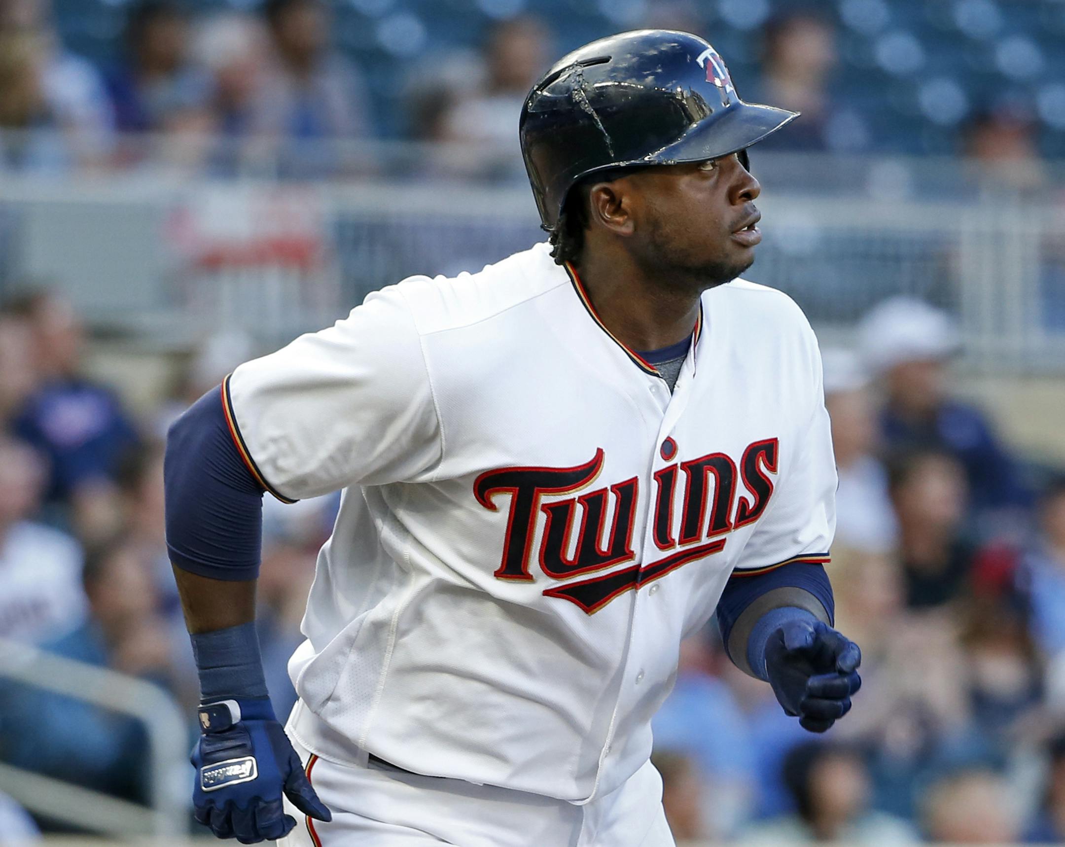 Minnesota Twins' Miguel Sano watches his two-run home run against the Chicago White Sox during the first inning of a baseball game Tuesday, June 20, 2017, in Minneapolis. (AP Photo/Bruce Kluckhohn)