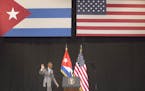 United States President Barack Obama waves as he arrives to the podium to address the Cuban people at the National Theater in Havana, Cuba, Tuesday, M
