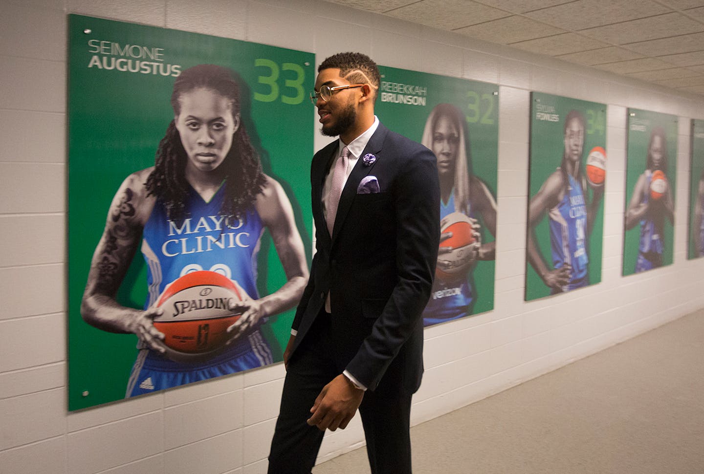 Karl-Anthony Towns walks down the hall at Target Center on his way to the announcement of his award of NBA Rookie of the Year.