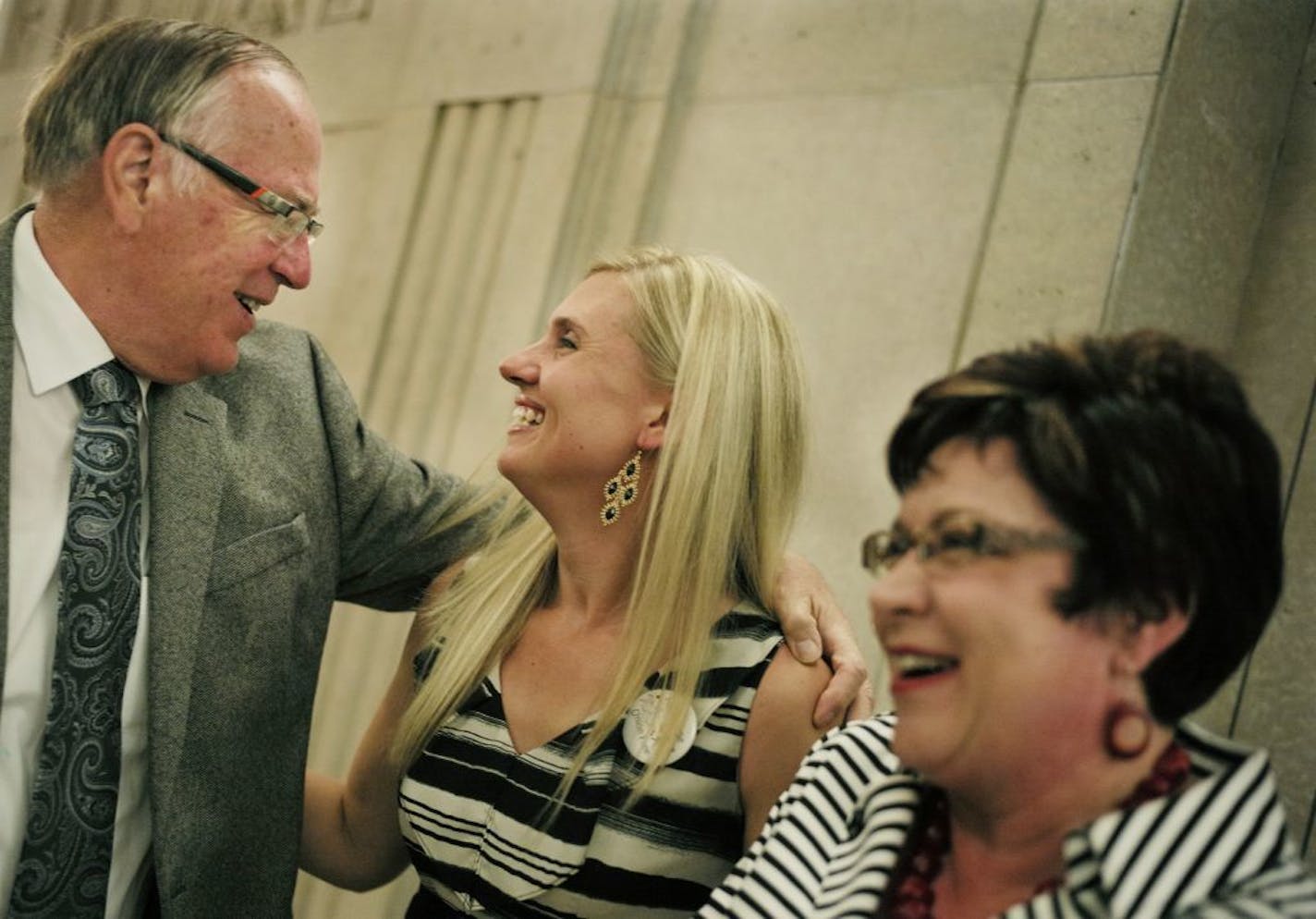 At the House of Representative building, Jennifer Parrish , Senators David Senjem and Carla Nelson celebrated a Supreme Court ruling case in Illinois that undermines the constitutionality of the 2013 �Family Child Care Providers Representation Act" in Minnesota. Parrish and 11 other home care providers filed the lawsuit.