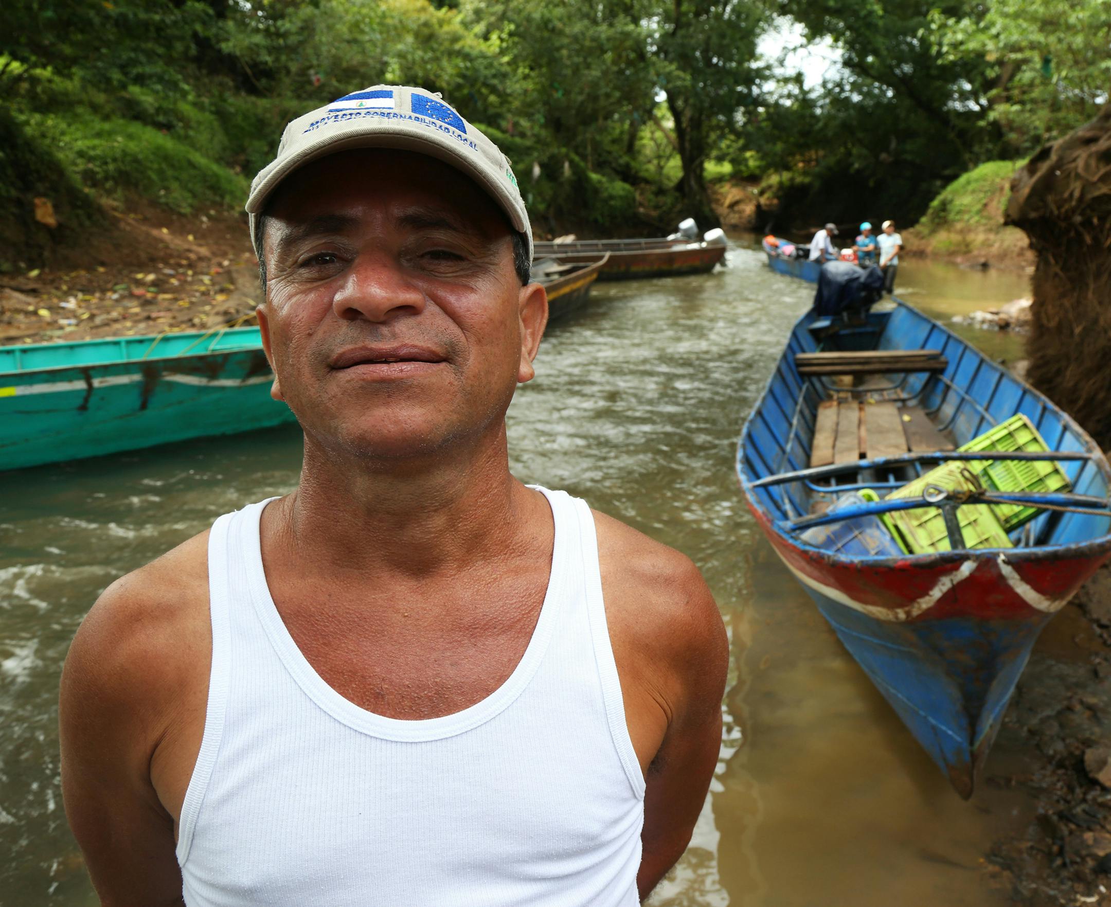 Franklin Espinoza Cortez, a founder of the town Puerto Principe, stands along the river that runs through town. He says that the proposed Nicaragua canal is a good opportunity for locals, but that he expects to negotiate the sale price of his four homes and corner bar. "I won't take any less than $400,000 for them," Espinoza said. (Brittany Peterson/McClatchy DC/TNS)