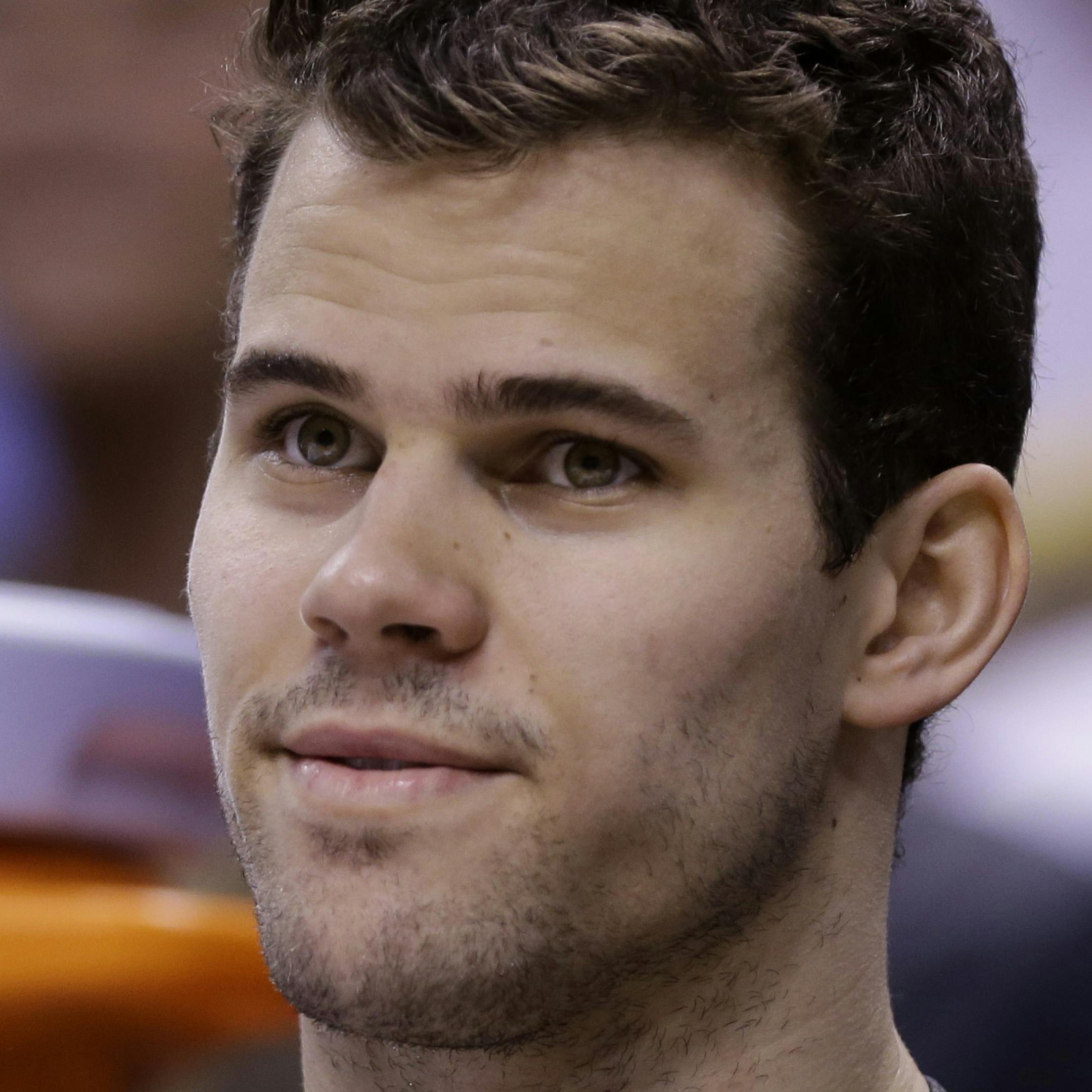 Brooklyn Nets forward Kris Humphries watches from the bench in the first half of an NBA basketball game against the Indiana Pacers in Indianapolis, Friday, April 12, 2013. (AP Photo/Michael Conroy)