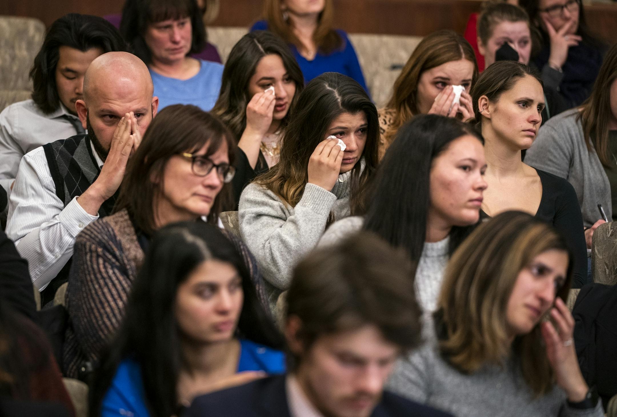 A crowd of former students, faculty and staff from Argosy University became emotional during the public testimony.
