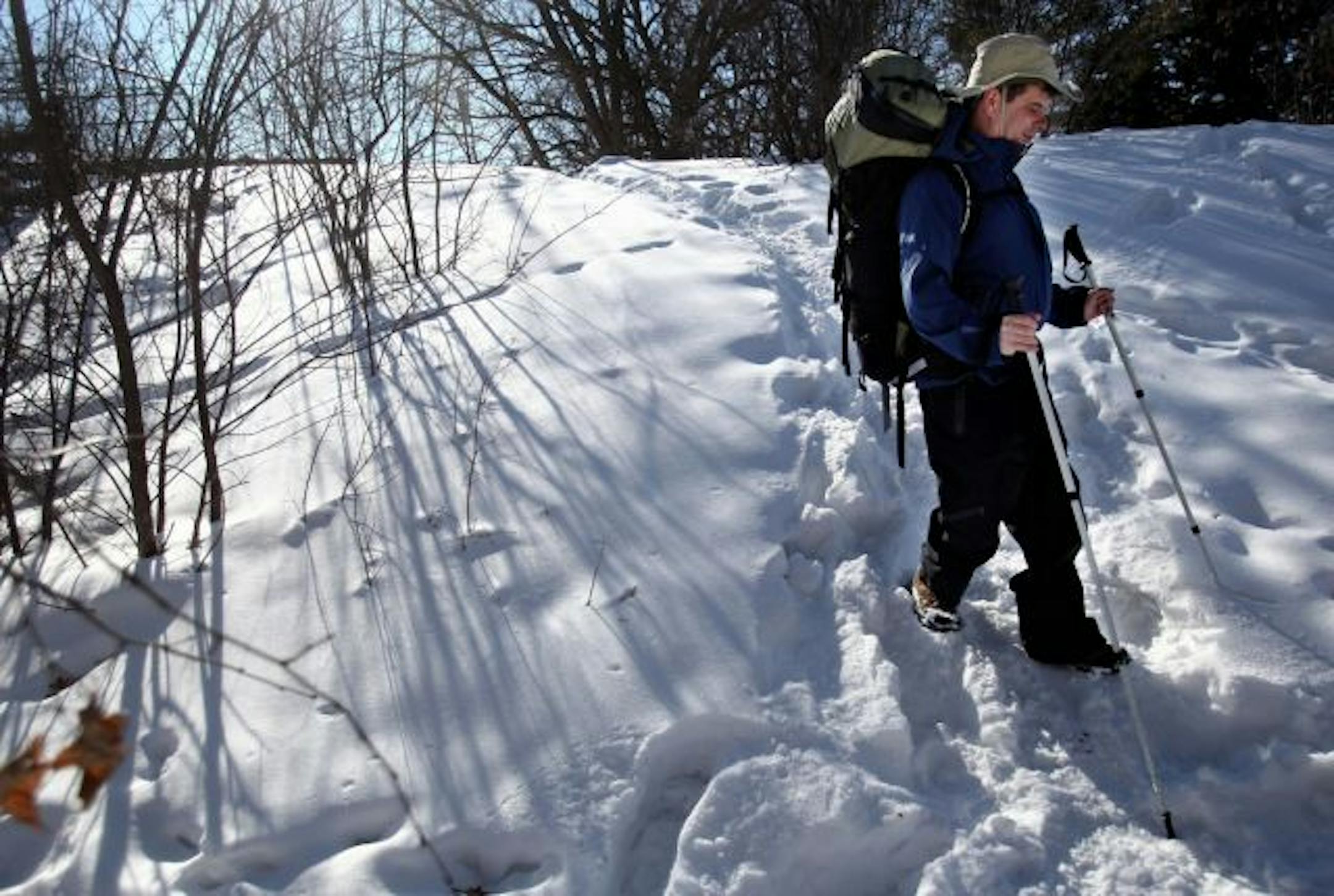 Mike Hanson navigated a snowy hillside recently while hiking along a trail in St. Louis Park. The 44-year-old, blind since birth, will begin hiking the 2,174-mile Appalachian Trail next week, guided by GPS technology that he has programmed into his cell phone.