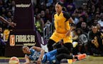 Minnesota Lynx guard Renee Montgomery (21) loses the ball while defended by Los Angeles Sparks guard Odyssey Sims (1) in the fourth quarterduring Game
