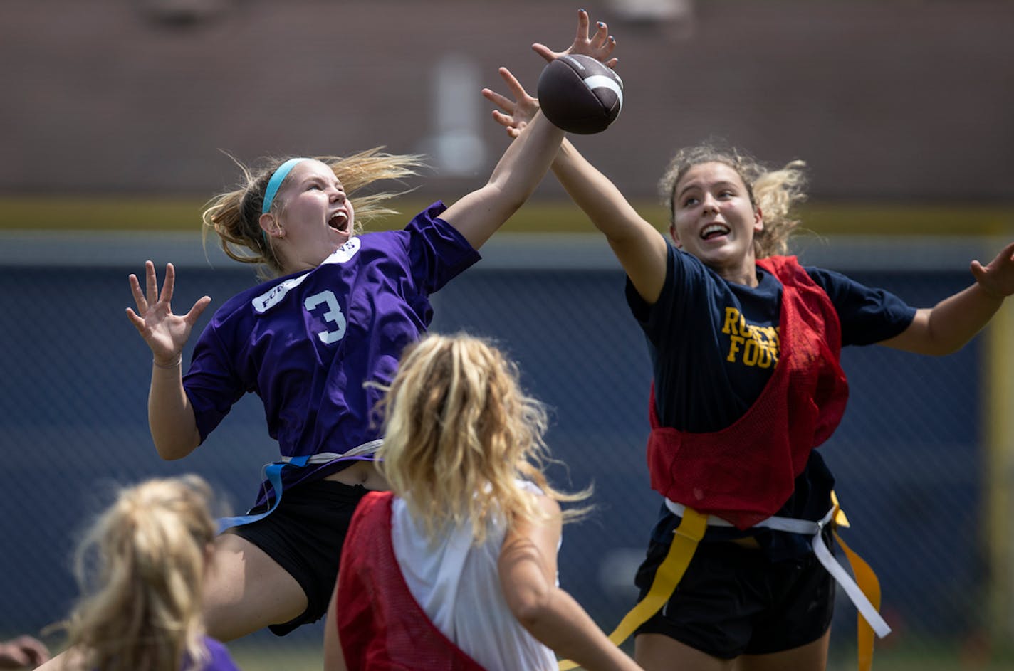 Ava Thompson left, of the Purple Cow tipped the ball away from Tayah Leenderts fo All-Americans.] Jerry Holt •Jerry.Holt@startribune.com