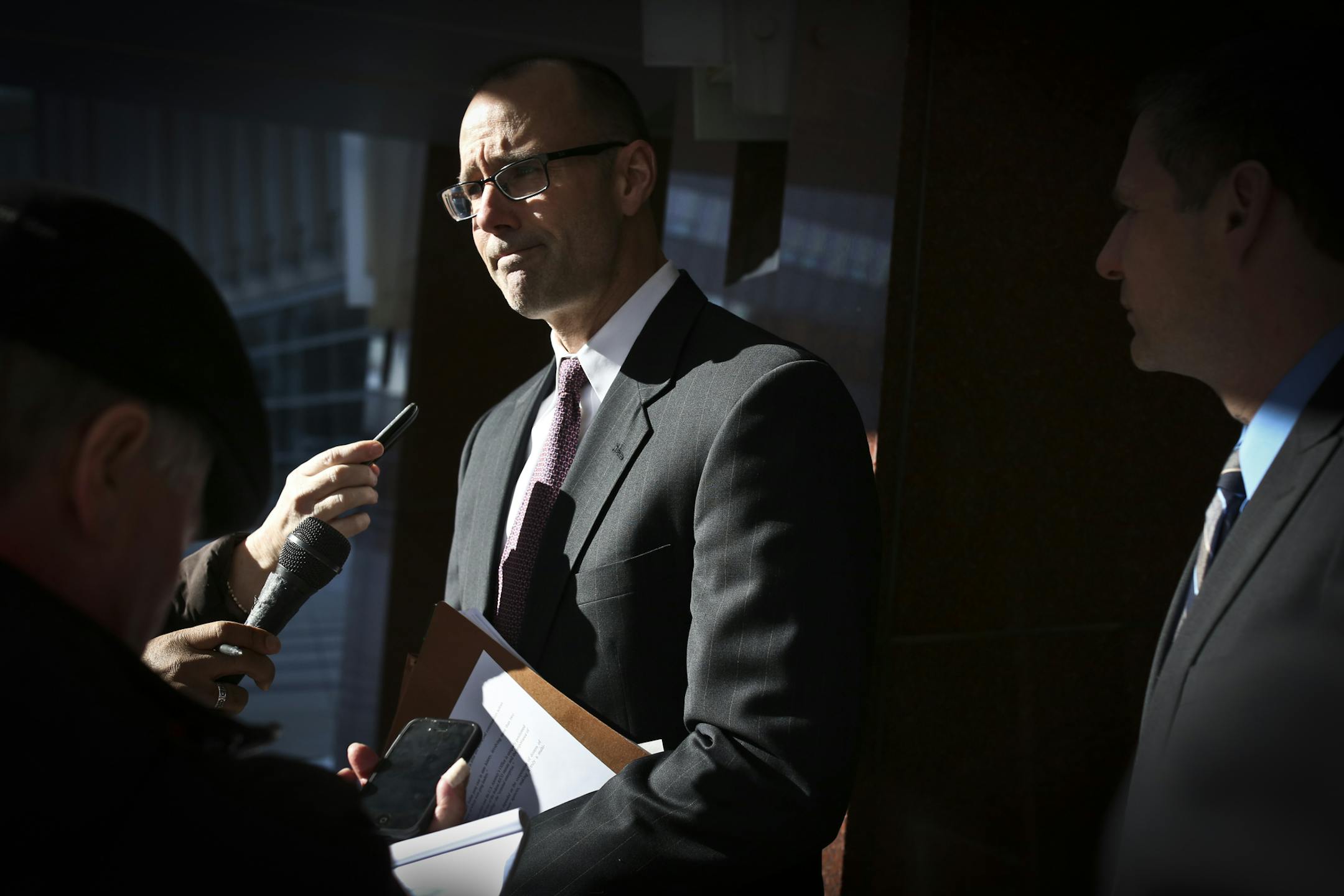Assistant U.S. Attorney Andrew Winter spoke to the press outside the Federal Courthouse on Tuesday, March 19, 2013, in Minneapolis, Minn., after a guilty verdict in the American Indian gang accused of running a criminal enterprise that terrorized people in the Upper Midwest. ] (RENEE JONES SCHNEIDER * reneejones@startribune.com)