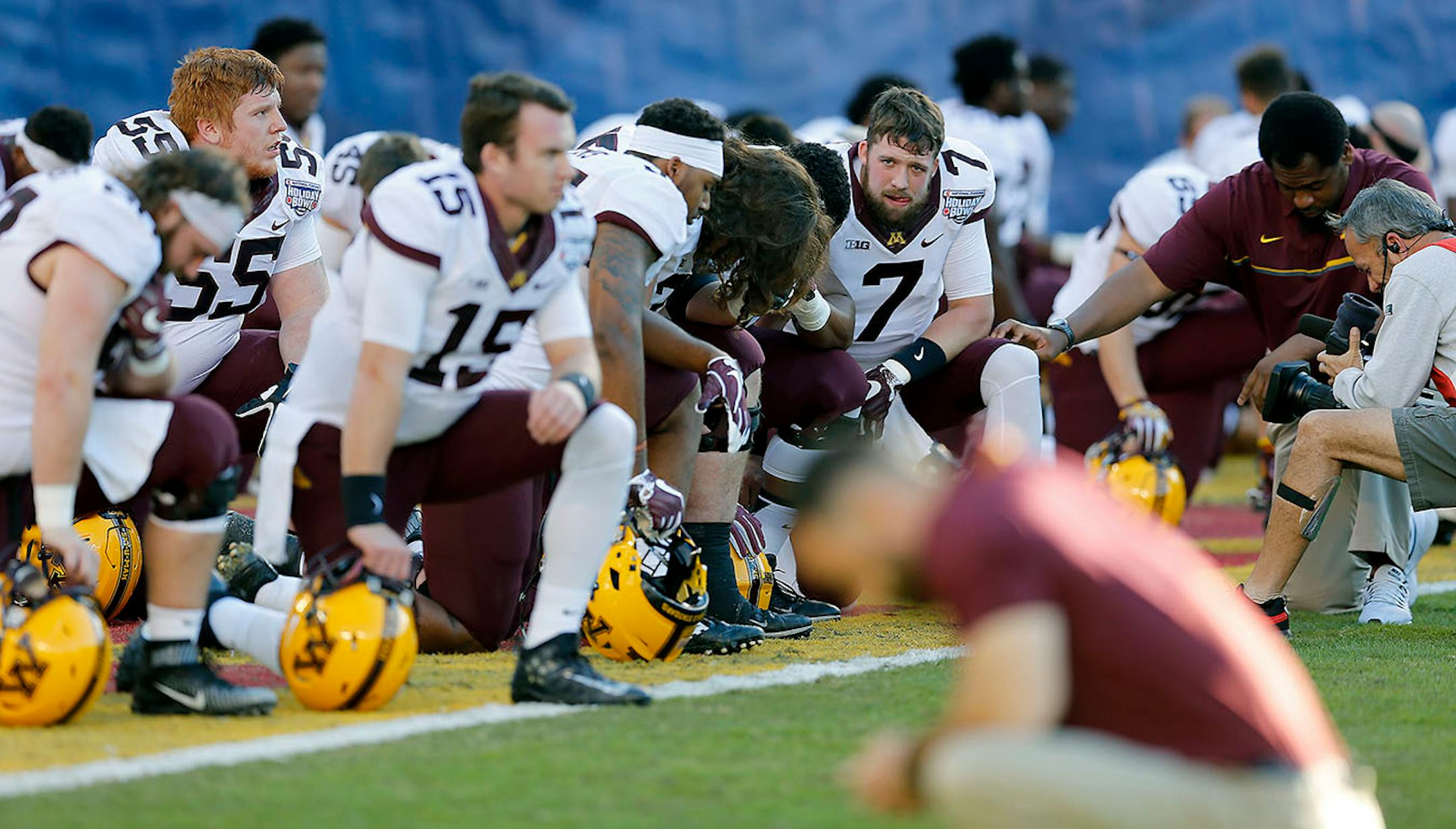 The Minnesota Gophers football team took to a knee for prayer before they took on Washington State at Qualcomm Stadium for the San Diego Holiday Bowl, Tuesday, December 27, 2016 in San Diego, CA.