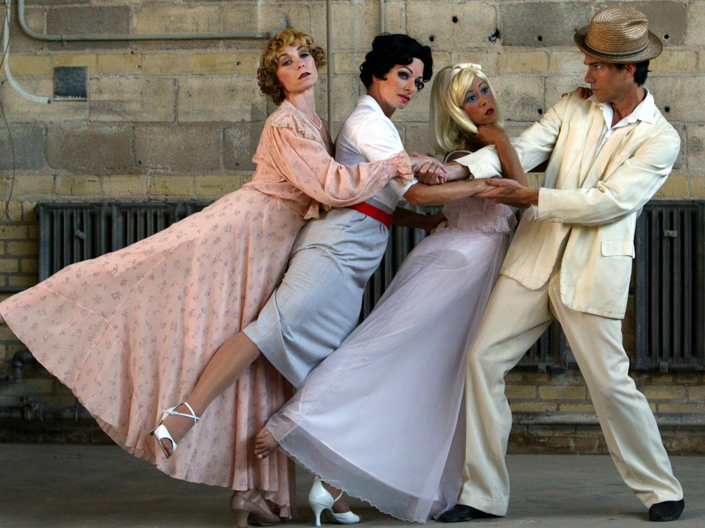 Julia Tehven (Blanche Du Bois), Stephanie Karr-Smith (Maggie the Cat), Stephanie Fellner (Baby Doll) and Robert Skafte (Tennessee Williams) in the "3X Tennessee" by Ballet of the Dolls.