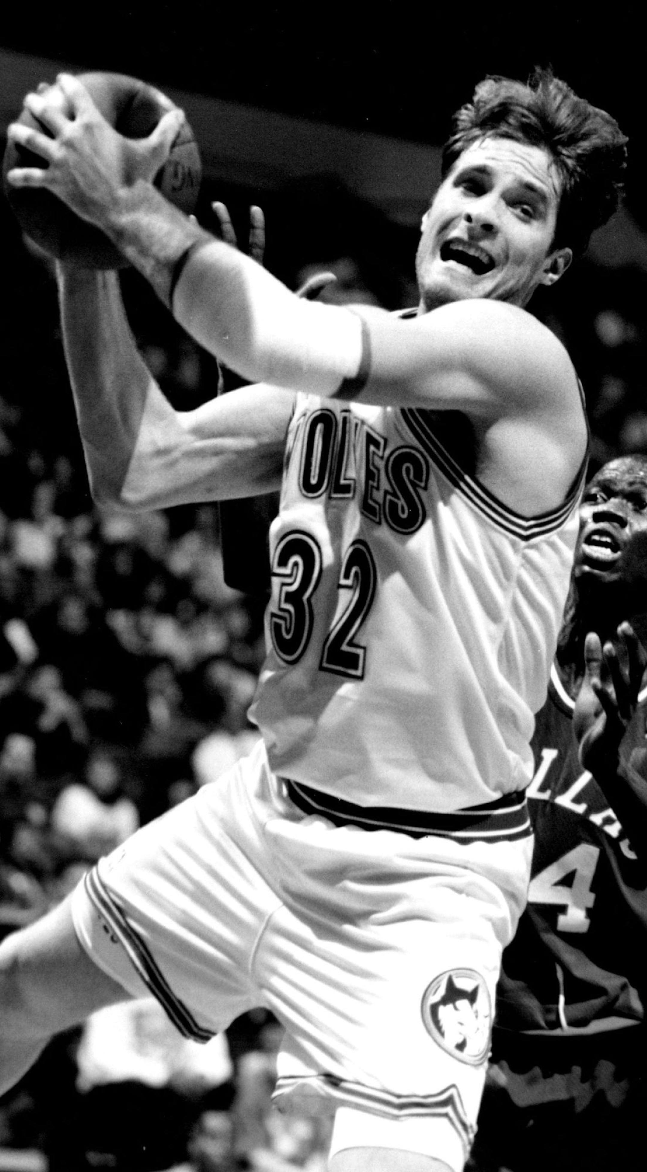 February 1, 1995 Wolves vs Dallas Photo 1. Jim Jackson of Dallas scores with a fade away jumper of Isaiah Rider Left and Sean Rooks during the 3rd period of NBA action. Photo 2. Christian Laettner grabs a rebound as Lorenzo Williams of Dallas looks on. February 2, 1995 Jerry Holt, Minneapolis Star Tribune