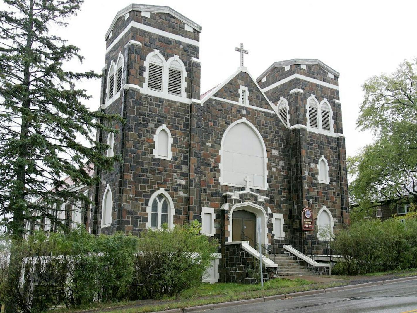 Built in 1926, St. Peter�s Church in Duluth, Minn., seen in an Oct. 20, 2013 photo, was closed in 2010. On Tuesday, Oct. 22, 2013, the Duluth Heritage Preservation Commission tabled consideration for giving the building landmark designation, meaning that time could be running out on St. Peter's Catholic Church.