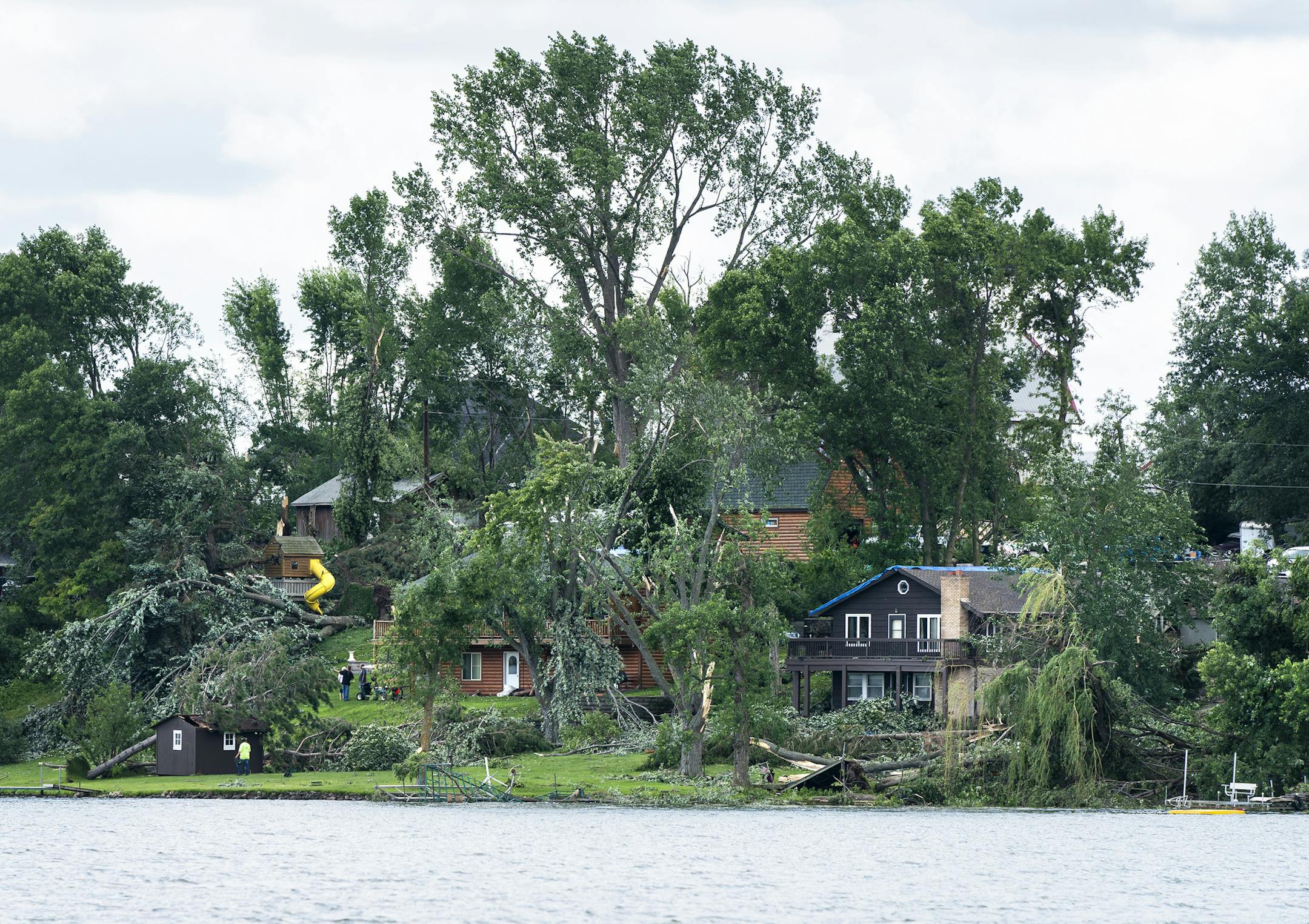 Some of the damage from Sunday's tornado outbreak was significant. Here's a look at the cleanup around Bone Lake in Scandia on Monday.
