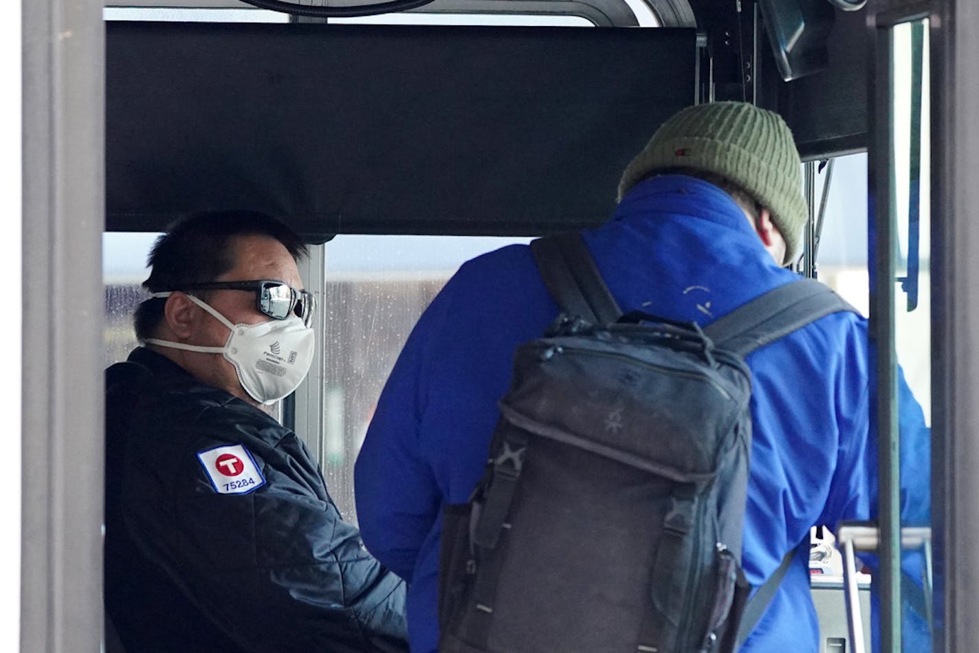 A Metro Transit bus driver on Nicollet Mall was one of several wearing a mask on Saturday, March 21, in downtown Minneapolis.