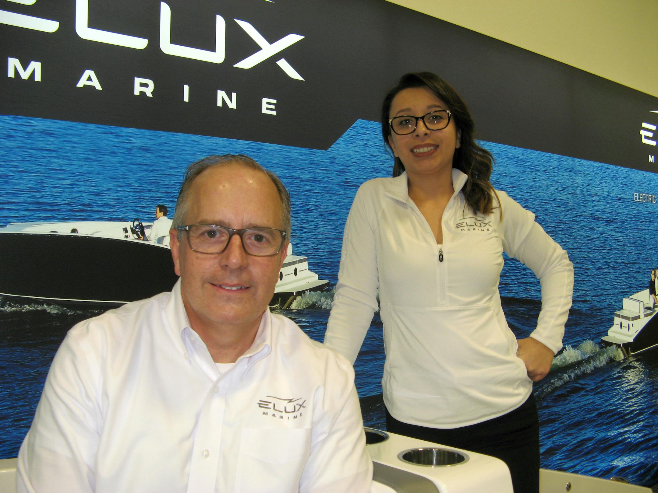 Howard Root and Annette Flores of Elux Marine of Mayer, Minn., are ramping up their heir electric-powered pontoon boat compay, Elux Marine of Mayer, Minn. They are pictured at the Minneapolis Boat Show. Photo: Neal.St.Anthony@startribune.com