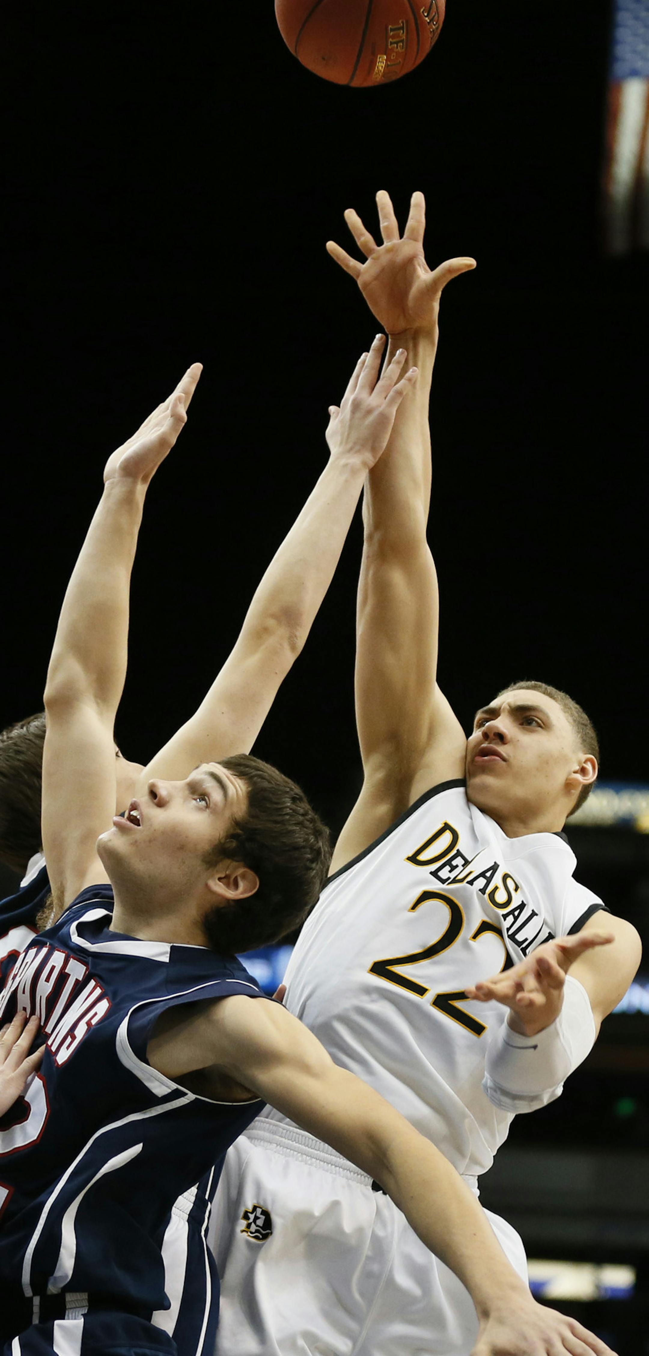 Reid Travis of DeLaSallle scored on the Orono defenders during class 3A Minnesota State boys basketball tournament between DeLaSalle and Orono at Target Center March 13, 2014 in Minneapolis, MN. ] JERRY HOLT jerry.holt@startribune.com