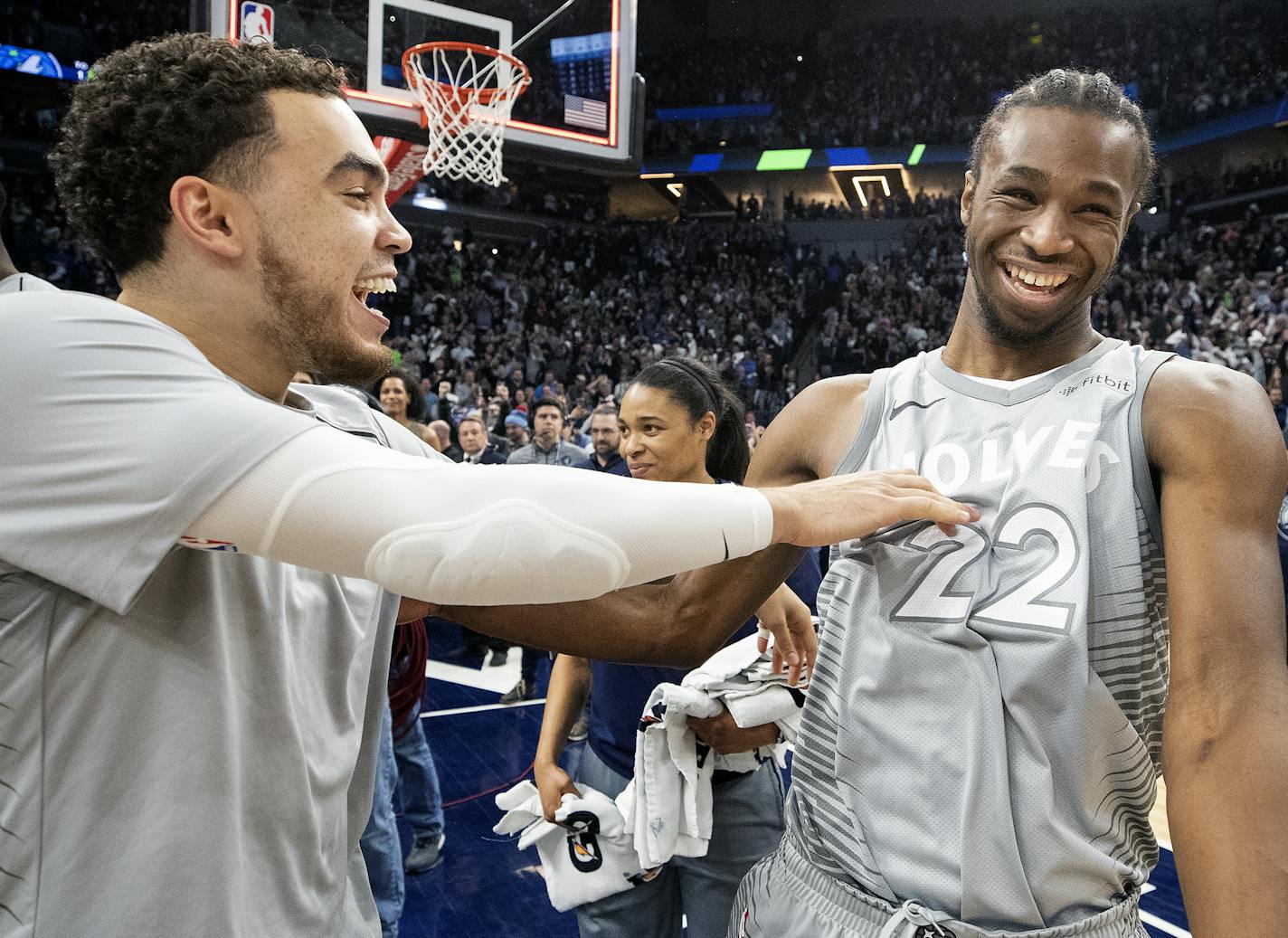 Minnesota Timberwolves Tyus Jones and Andrew Wiggins (22) celebrated at the end of the game. ] CARLOS GONZALEZ &#xef; cgonzalez@startribune.com &#xf1; April 11, 2018, Minneapolis, MN, Target Center, NBA, Basketball, Minnesota Timberwolves vs. Denver Nuggets