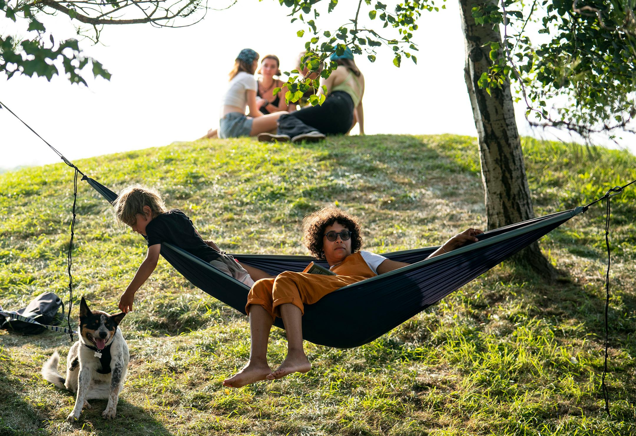 Festival goers lounged around Bayfront Festival Park during the Water is Life Festival on Wednesday.