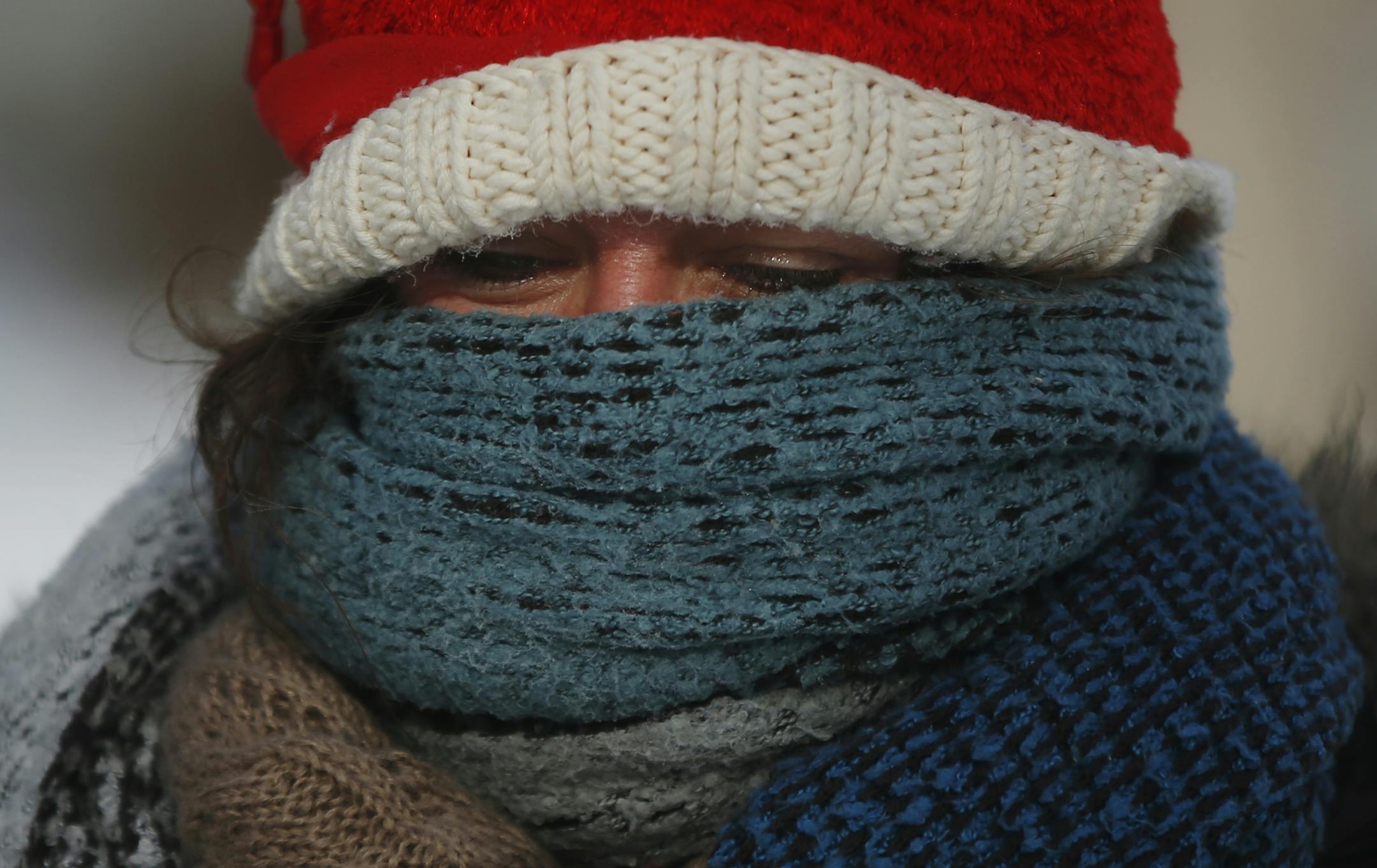 Betsy Ranum, who is from Minnesota but now lives in New York bundled up while walking down Lyndale Ave S after having breakfast. Sunday begins a week of polar vortex bone-chilling weather.] Richard Tsong-Taatarii/rtsong-taatarii@startribune.com