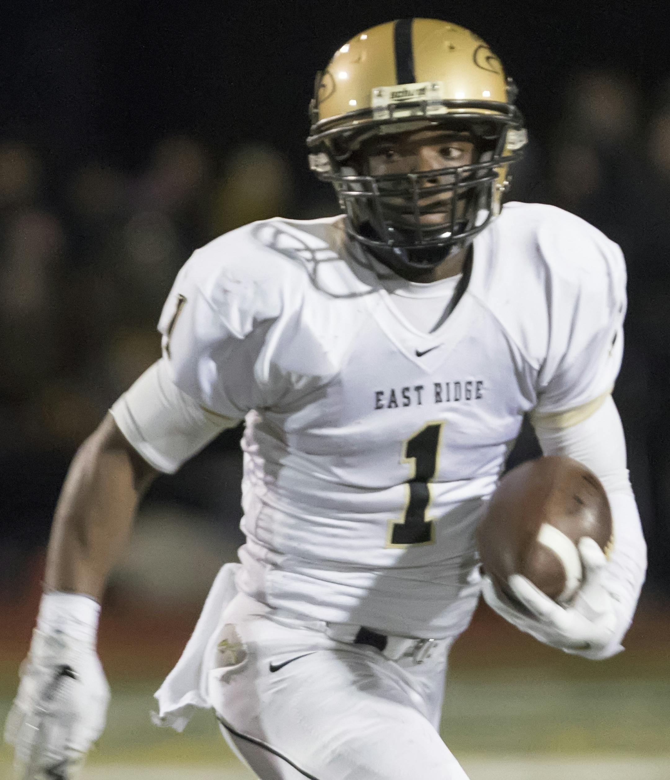 East Ridge quarterback Otumus Payemanu (1) darts around the edge as the Maple Grove Crimson faced the East Ridge Raptors in the Class 6A MSHSL Football semifinals. ] MATT BLEWETT &#xef; matt@mattebphoto.com - November 6, 2015, Eden Prairie, MN, East Ridge Raptors, Maple Grove Crimson, Prep Football, East Ridge Raptors vs Maple Grove Crimson, 438977 PREP110715 ORG XMIT: MIN1511062221400247