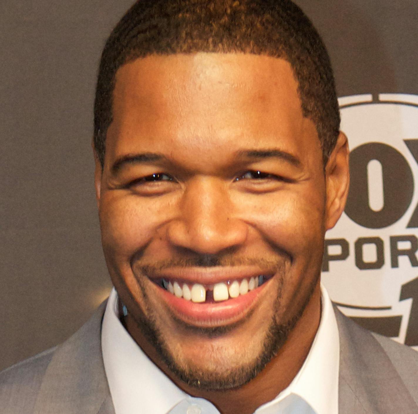 Michael Strahan arrives at Fox Sports 1 Thursday Night Super Bash at Time Warner Cable Studios on Thursday, Jan. 30 2014, in New York. (Photo by Scott Roth/Invision/AP) ORG XMIT: INVW