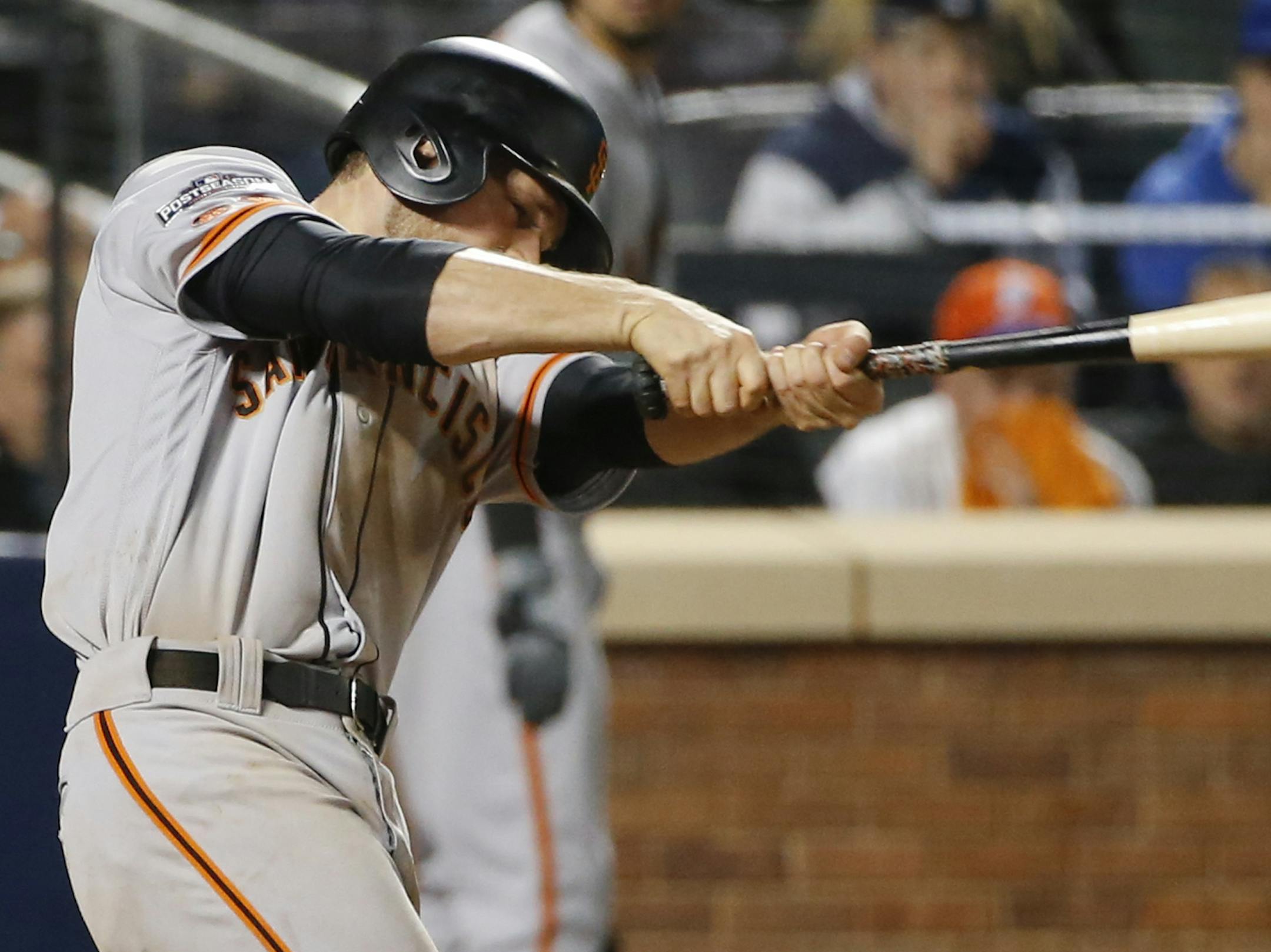San Francisco Giants' Conor Gillaspie connects for a three-run home run against the San Francisco Giants during the ninth inning of the National League wild-card baseball game, Wednesday, Oct. 5, 2016, in New York. The Giants won 3-0. (AP Photo/Kathy Willens)