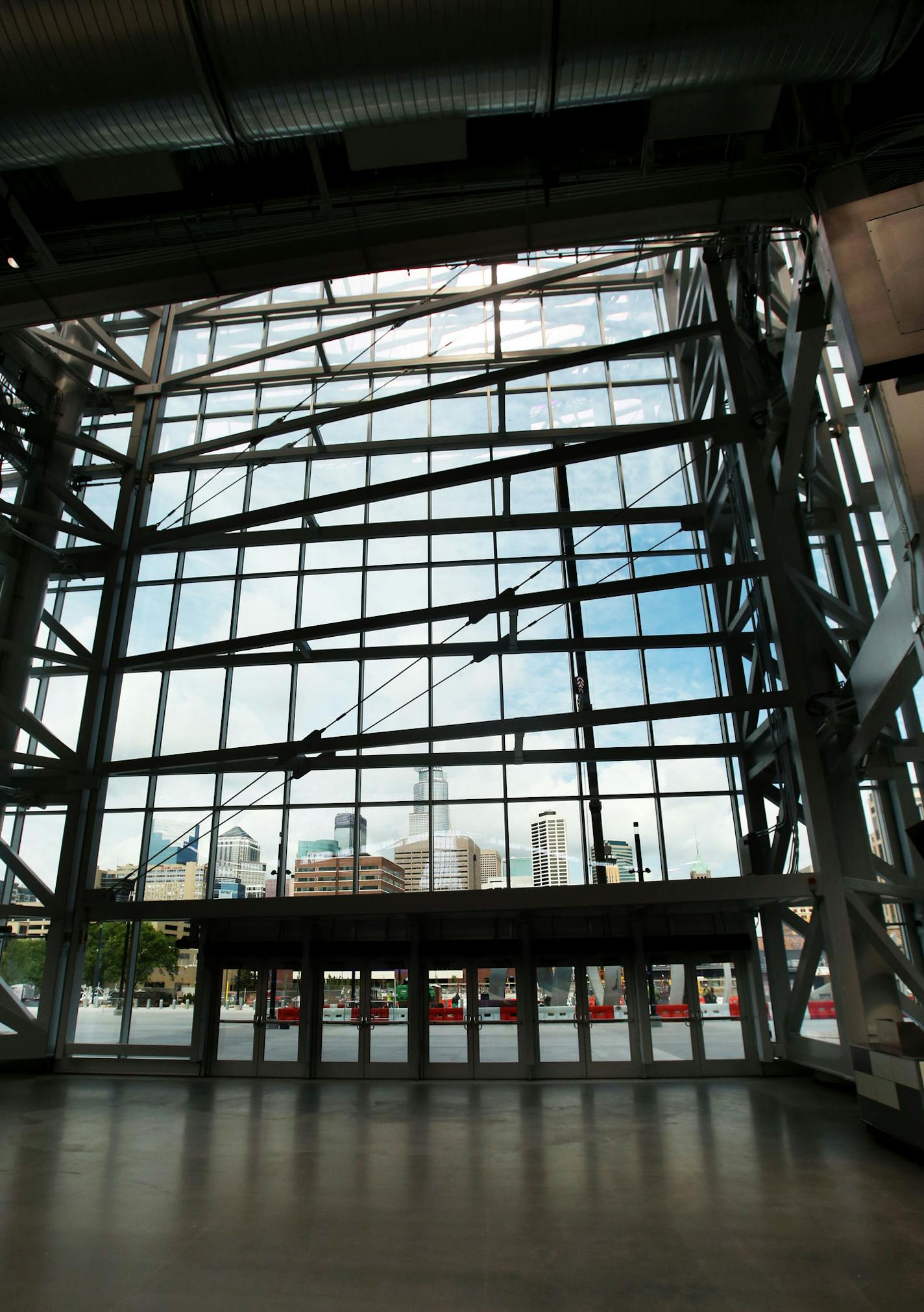 The Legacy Gate, made up of the world's largest glass doors, up to 95 feet tall and weighing 57,000 pounds, during a media tour Tuesday, July 19, 2016, at U.S. Bank Stadium in Minneapolis, MN.](DAVID JOLES/STARTRIBUNE)djoles@startribune Media day at the new U.S. Bank Stadium