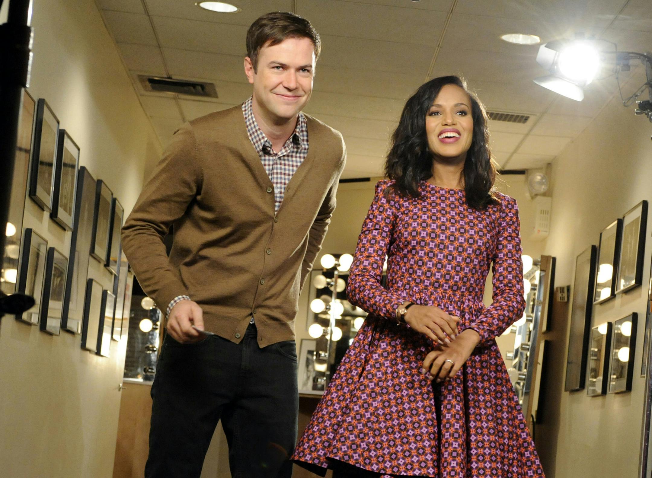 FILE - In this Oct. 29, 2013, file photo released by NBC, actress Kerry Washington, right, stands with cast member Taran Killam during a promotional shoot for "Saturday Night Live," in New York. After receiving criticism recently for its lack of a black female cast member, the show on Saturday, Nov. 2, 2013, opened with a skit where guest host Washington portrayed Michelle Obama, then Oprah Winfrey. She was asked to change into a Beyonce outfit - before executive producer Lorne Michaels stepped