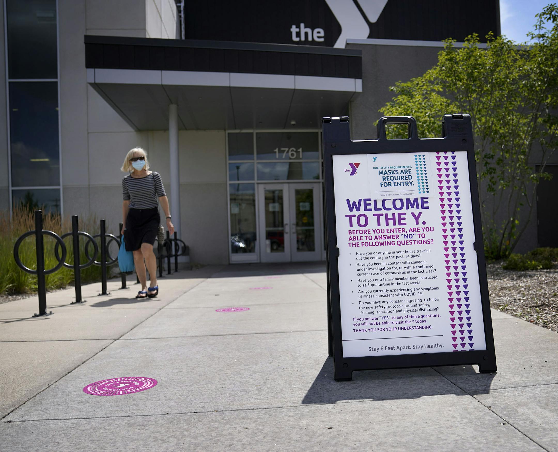 The Midway YMCA was one of two of the first YMCAs to reopen June 10 at 25% capacity. Here, COVID-19 rules are posted outside of the Midway YMCA for all entering Friday at the YMCA in St. Paul.] DAVID JOLES • david.joles@startribune.com The YMCA of the Greater Twin Cities has taken a big hit financially during COVID-19 as programs -- from fitness centers to childcare -- remain closed. The nonprofit furloughed 90% of its staff and is looking for new partnerships to boost revenue. Moody's downgrade