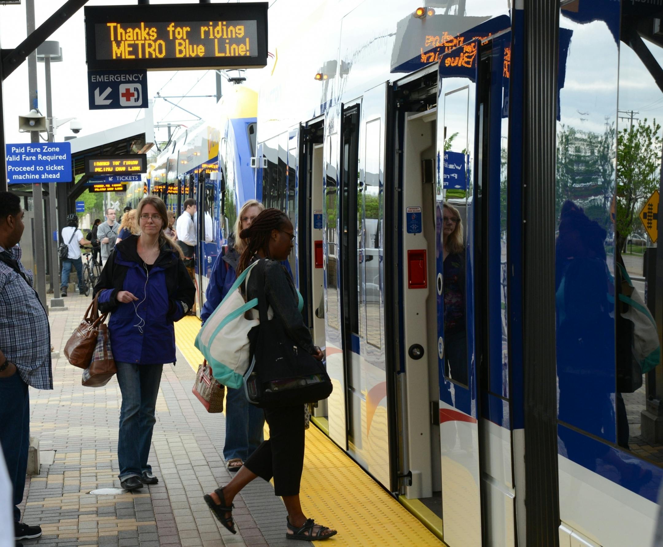 The Hiawatha Light Rail Line is being rebranded as the METRO Blue Line. The Blue Line is the first of the Twin Cities METRO system of rapid transit lines which include METRO Red Line Bus Rapid Transit on Cedar Ave. METRO Blue Line trains will now have three cars and will run every ten minutes throughout most of the day. Twelve new light-rail vehicles dedicated to the line will allow this increased service capacity. During the kickoff event Metro Transit staff handed out Blue line pens, new sched