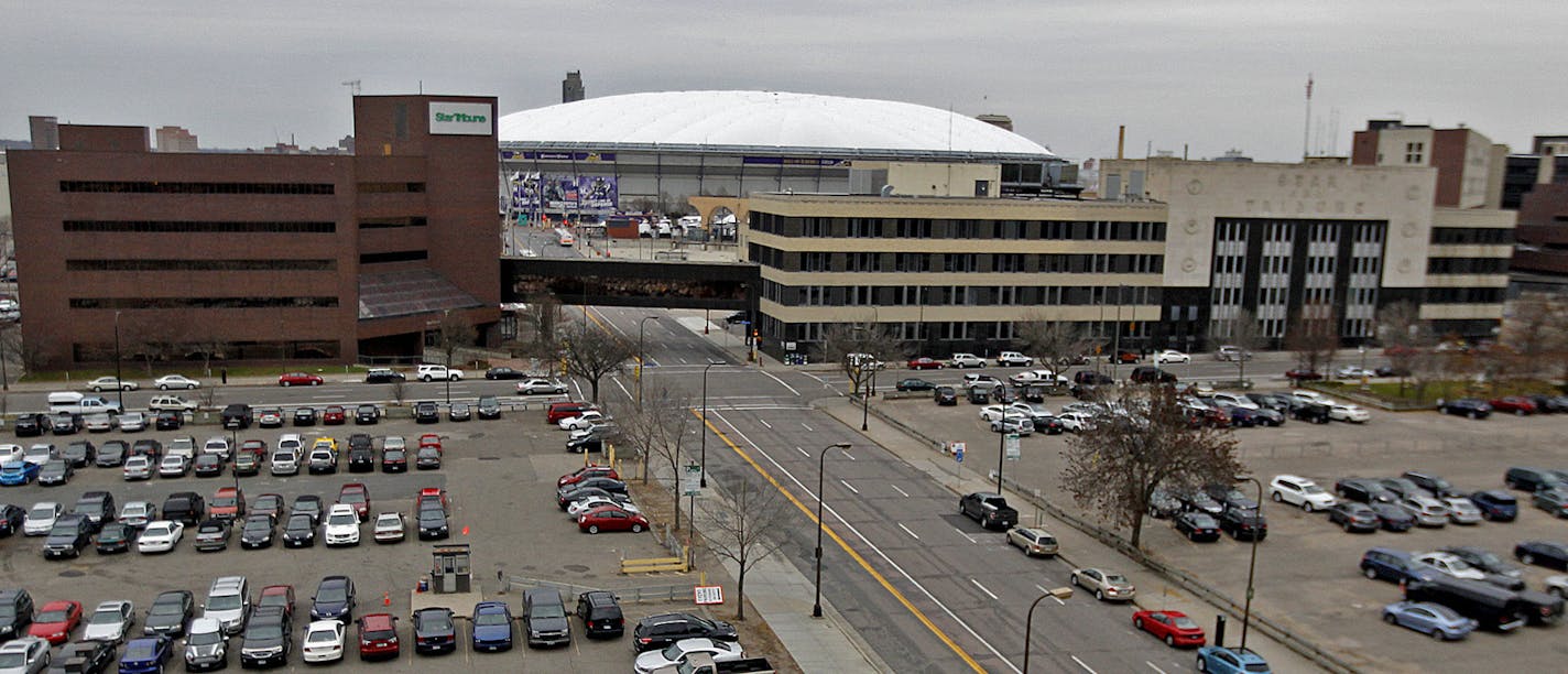 The largest downtown Minneapolis real estate deal in a generation remains plagued by many unsettled issues as city officials scramble to get it approved before City Hall leadership changes at year's end. The $400 million proposal to build a mixed-use development, parking lot and park adjacent to the new Vikings stadium is still a work in progress. The City Council has not yet reviewed the details of the public financing package, primary tenant Wells Fargo is withholding its firm commitment and p