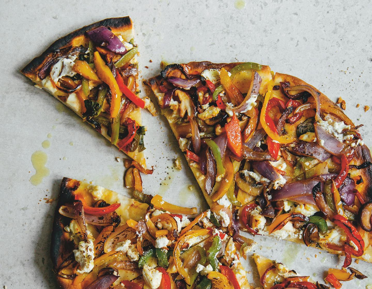 Barbecued Mediterranean Pizza With Basil Oil and Ricotta is among the recipe cards in "The BBQ Companion" deck from Oscar Smith (Smith Street, $24.95). Photo: Billy Law