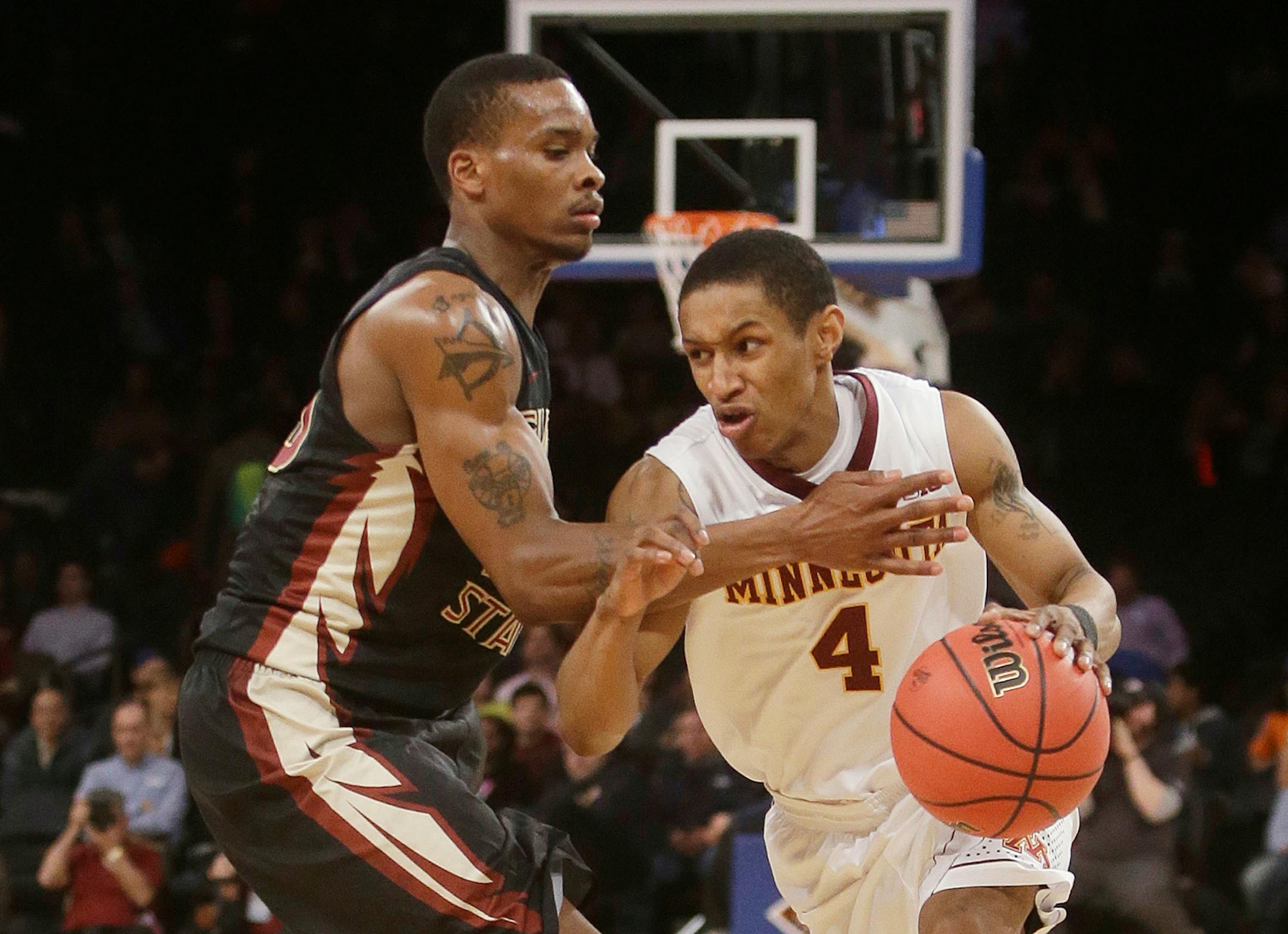 Gophers point guard Deandre Mathieu (4)
