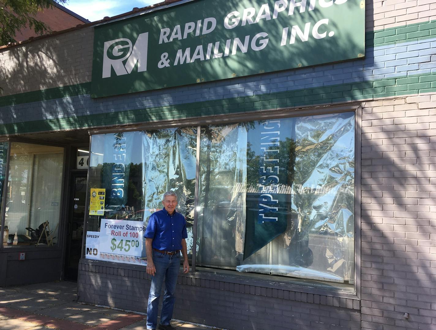 Warren Kapsner, owner of Rapid Graphics & Mailing, said new windows, signage and paint will help freshen up his store's exterior on Central Avenue.