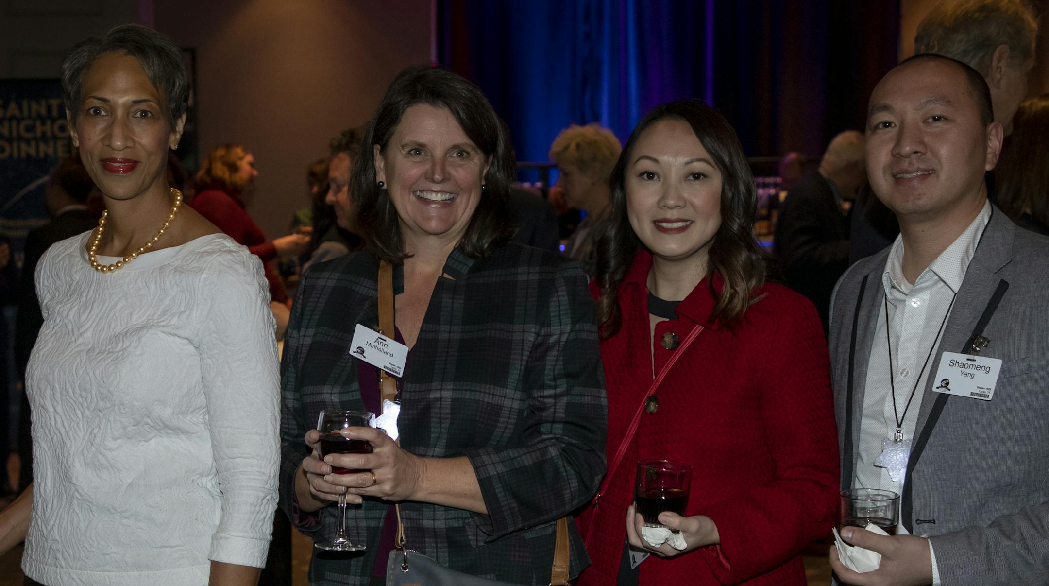 Rhonda Cox, Ann Mulholland, Sylvie Xiong, Shaomeng Yang at the 2019 Saint Nicholas Dinner. [ Special to Star Tribune, photo by Matt Blewett, Matte B Photography, matt@mattebphoto.com, Saint Nicholas Dinner, Catholic Charities, Dec. 5, 2019, Minnesota, 1009874409 FACE122219