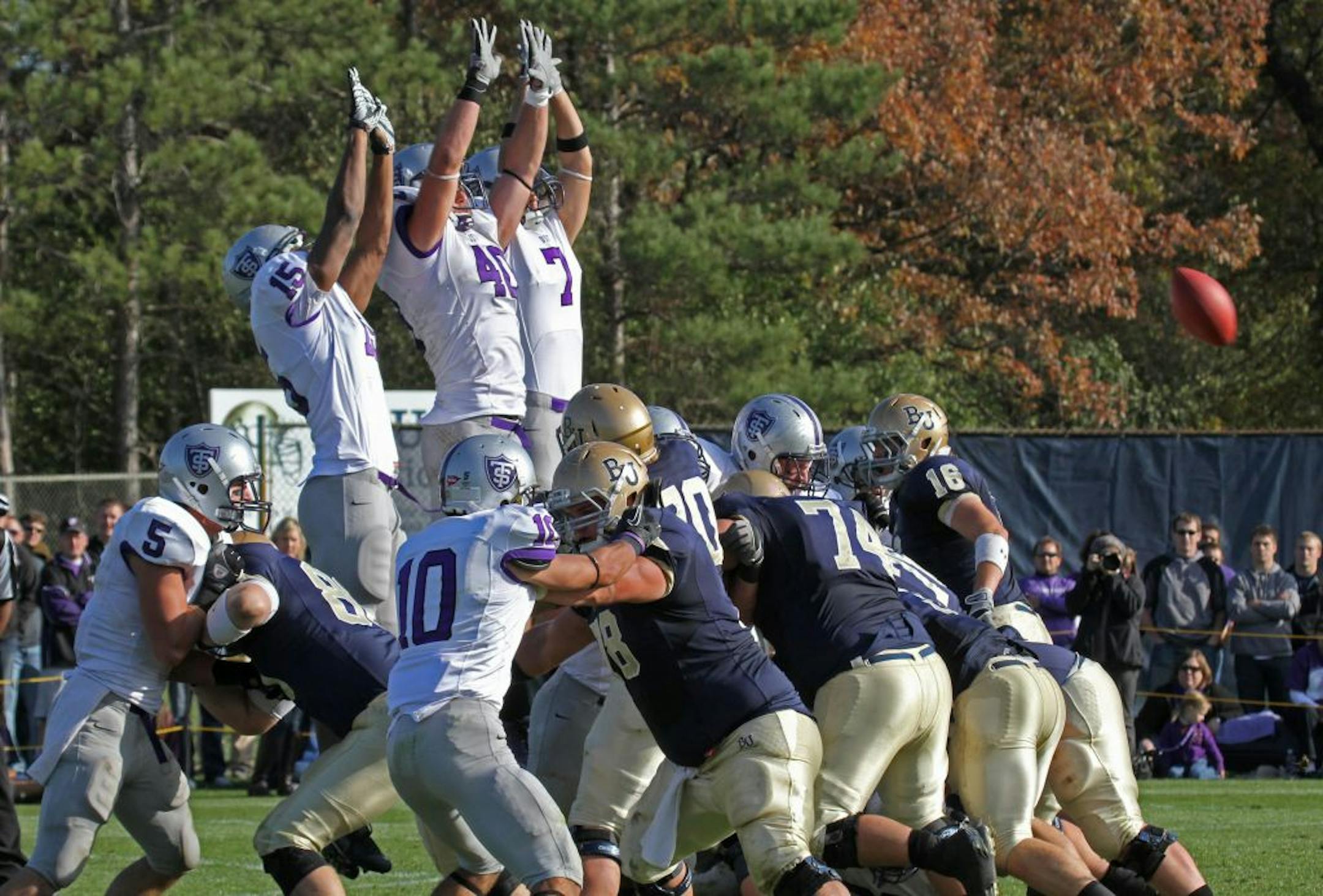 The St. Thomas defensive line blocked a point after attempt after Bethel scored on 10/22/11.